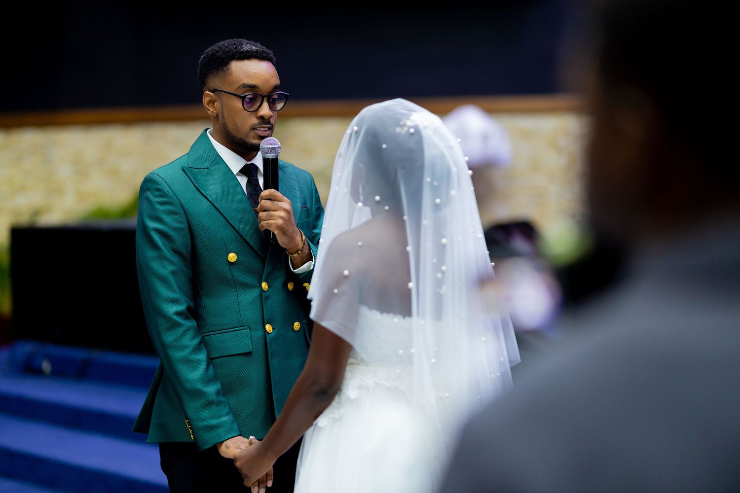 emotional moment for the guest at a wedding during exchange of vows.