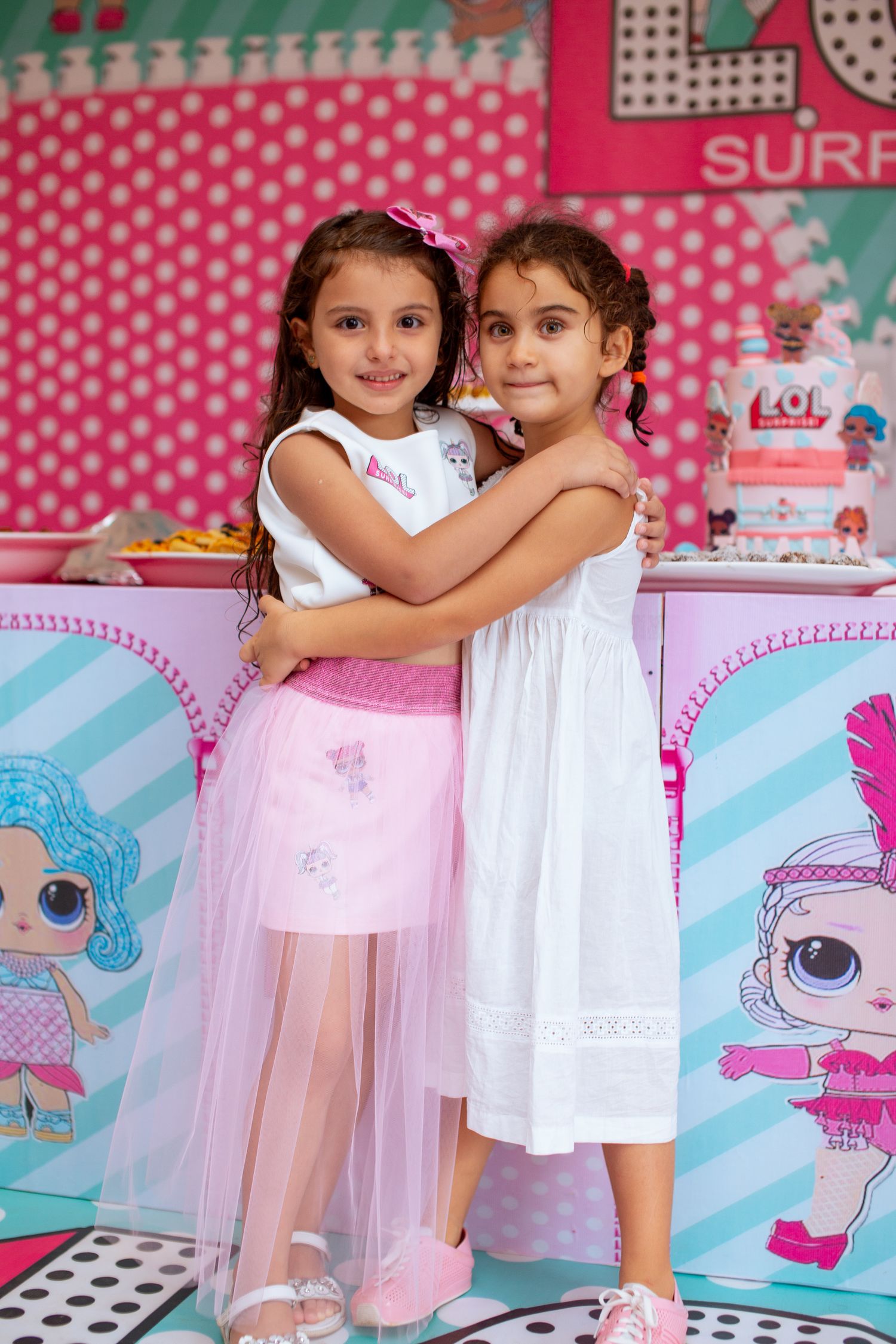 Colorful 5th birthday party setup with balloons and themed decor