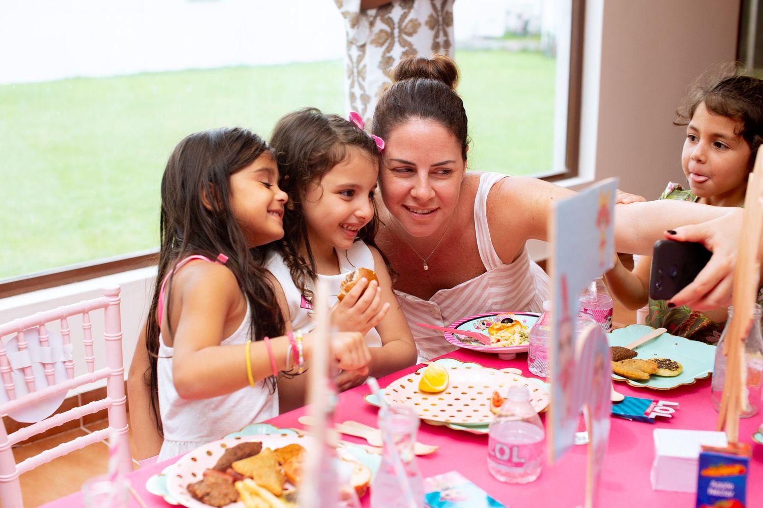 Colorful 5th birthday party setup with balloons and themed decor