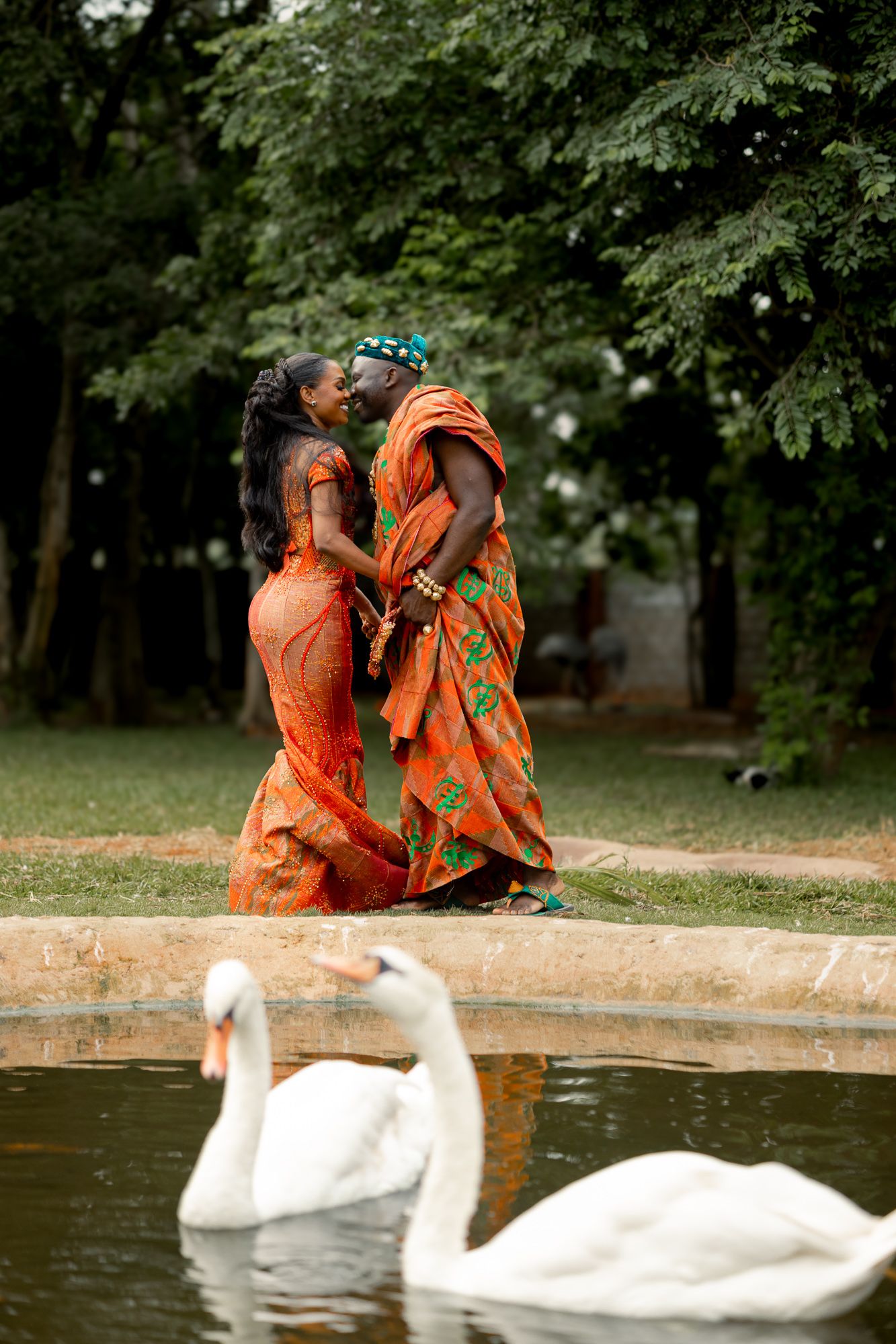 Luxury wedding portrait of bride and groom  with duck in Safari valley, Ghana