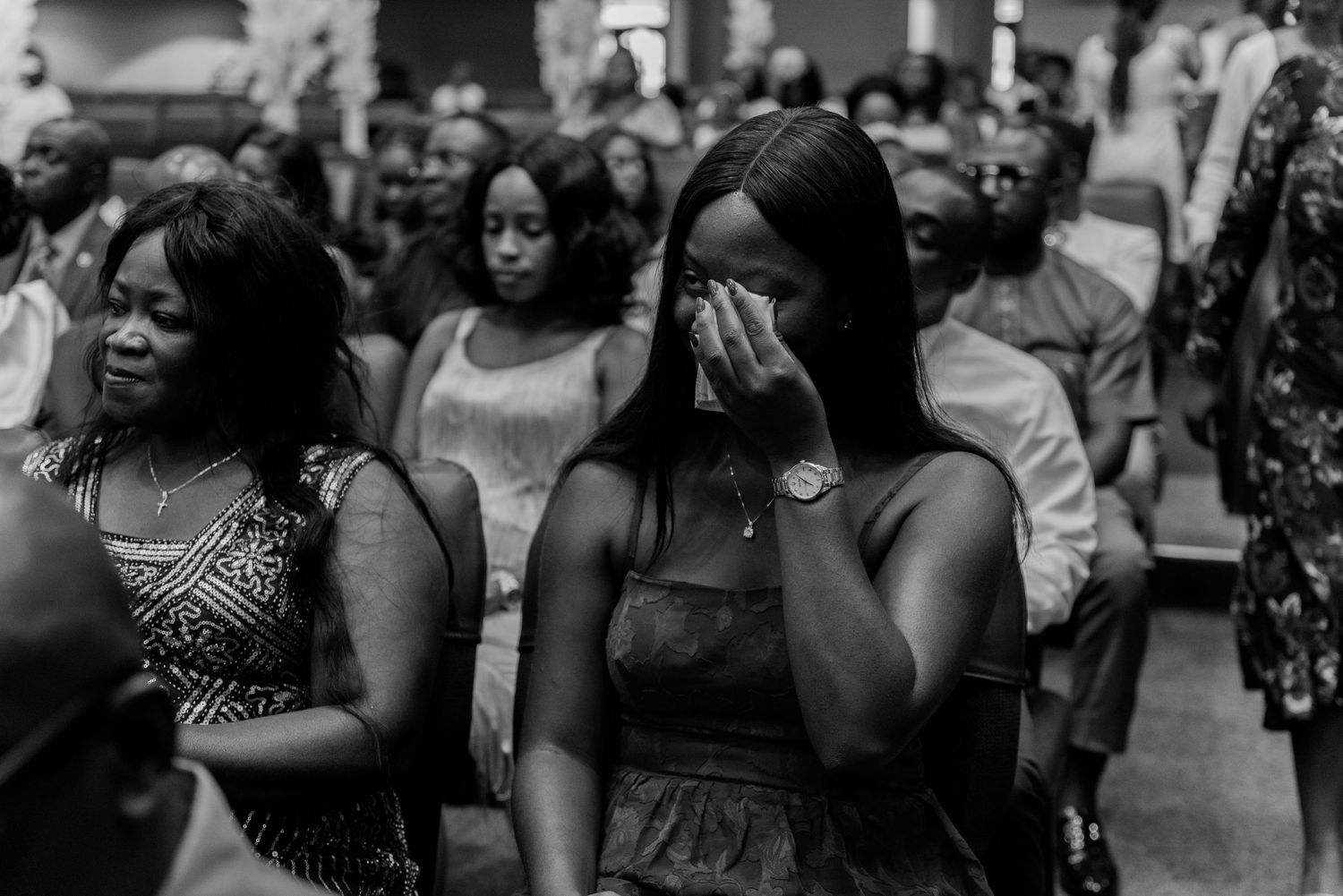 emotional moment for the guest at a wedding during exchange of vows.