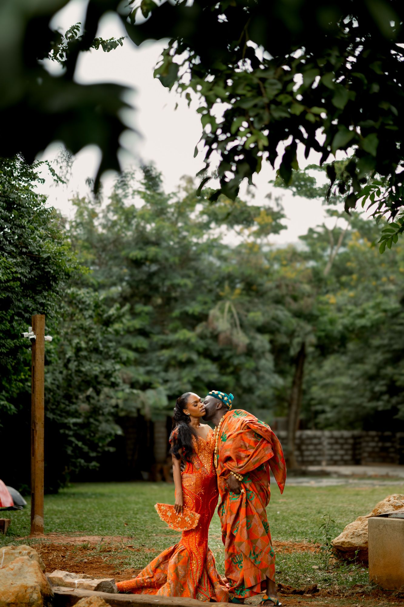 Luxury wedding portrait of bride and groom  with duck in Safari valley, Ghana