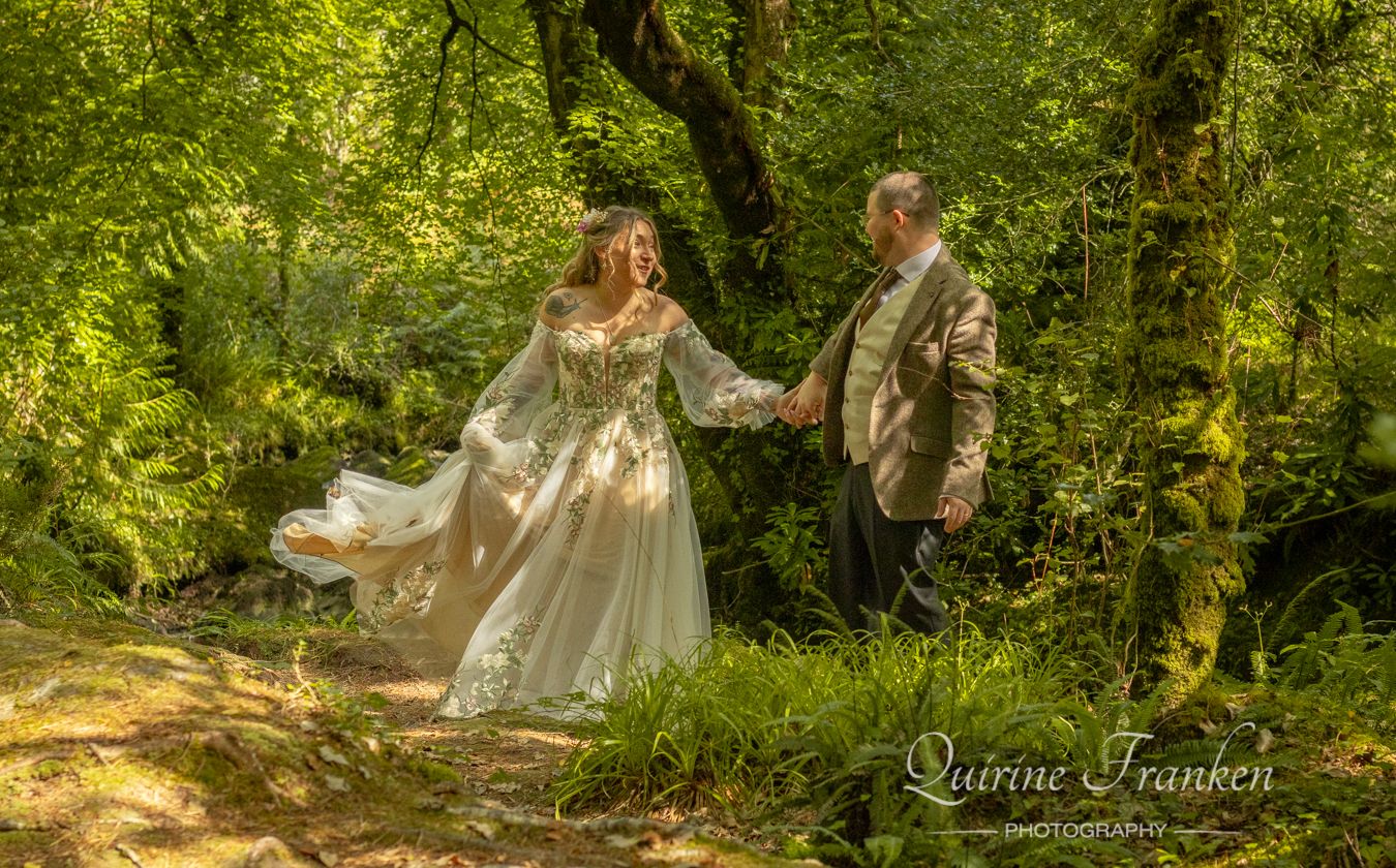 Dancing couple in Gelngarrif woods during elopement photography