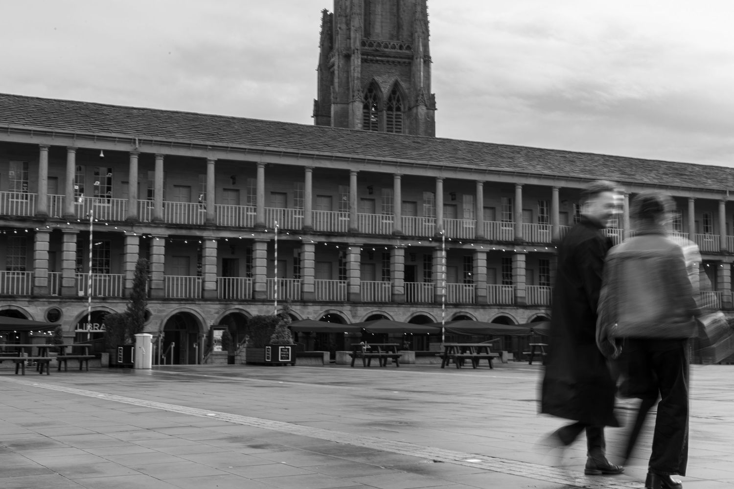 Couple celebrating engagement moment during Huddersfield photoshoot outdoors
