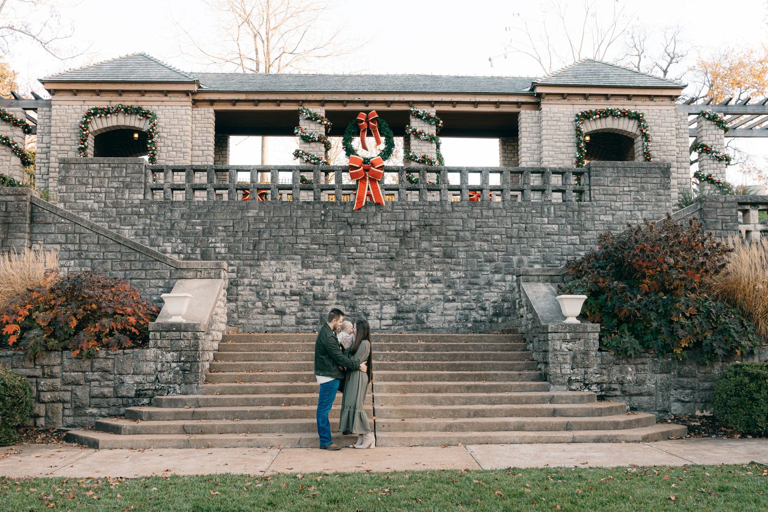 Stone steps and walls create an architectural backdrop for an outdoor photoshoot.