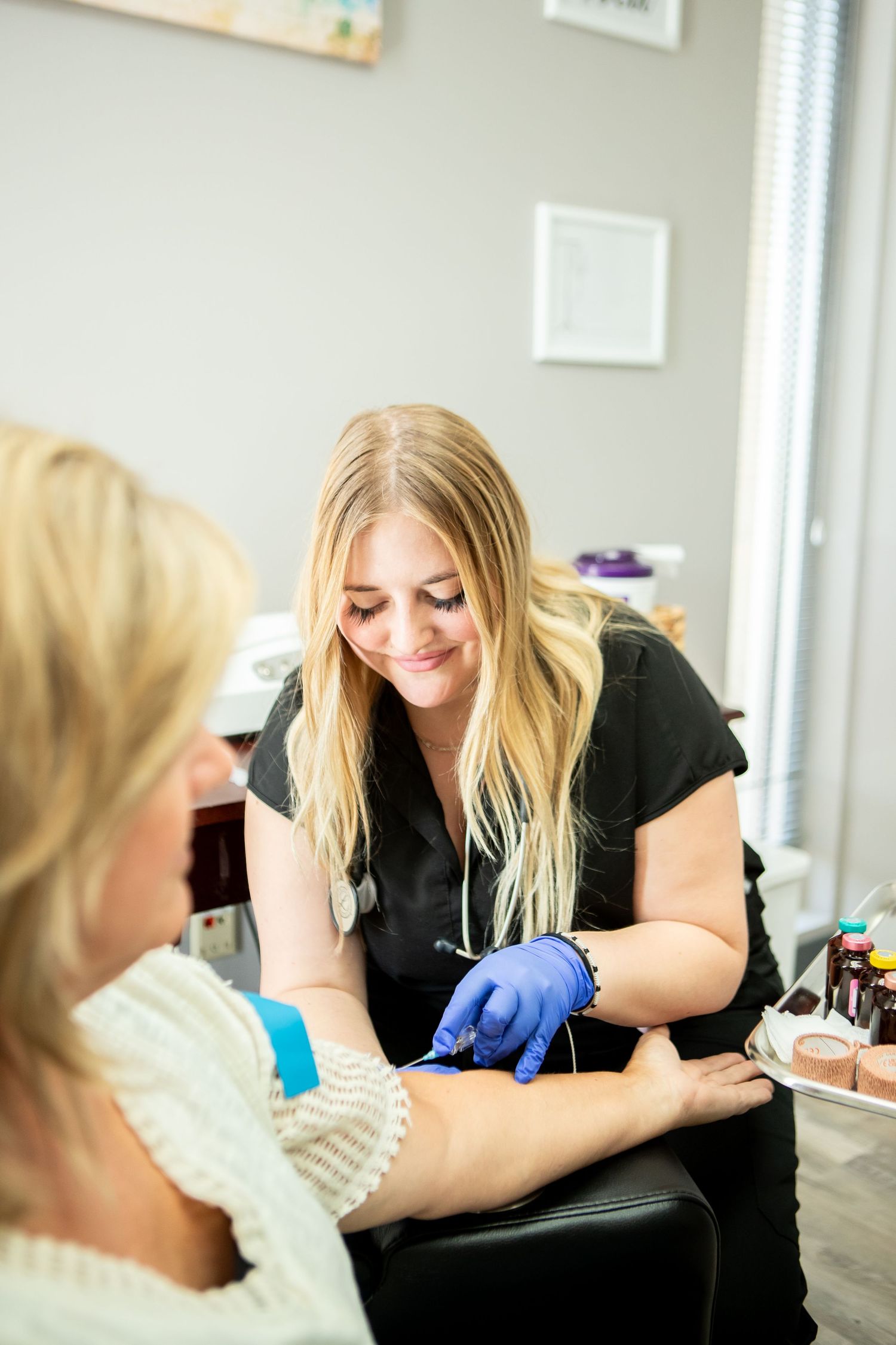 Professional performs treatment in a modern salon setting.