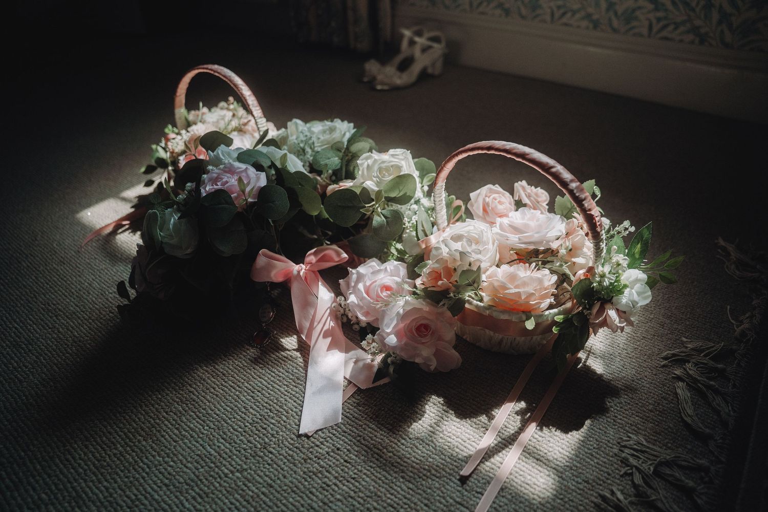 Delicate floral arrangements and decorations in soft lighting.