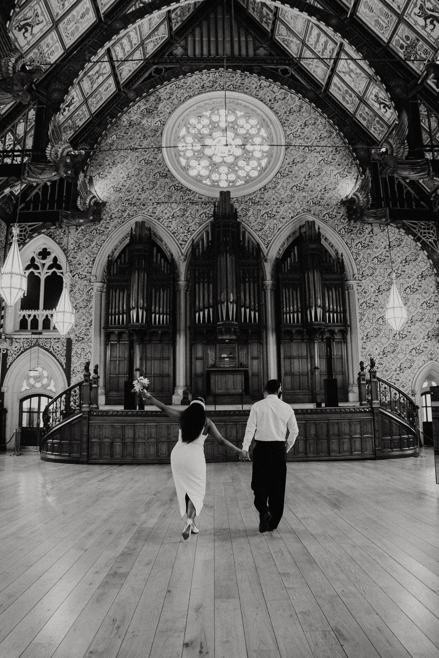 Black and white photos show couples dancing in a grand ballroom with ornate architecture and a mosaic ceiling.