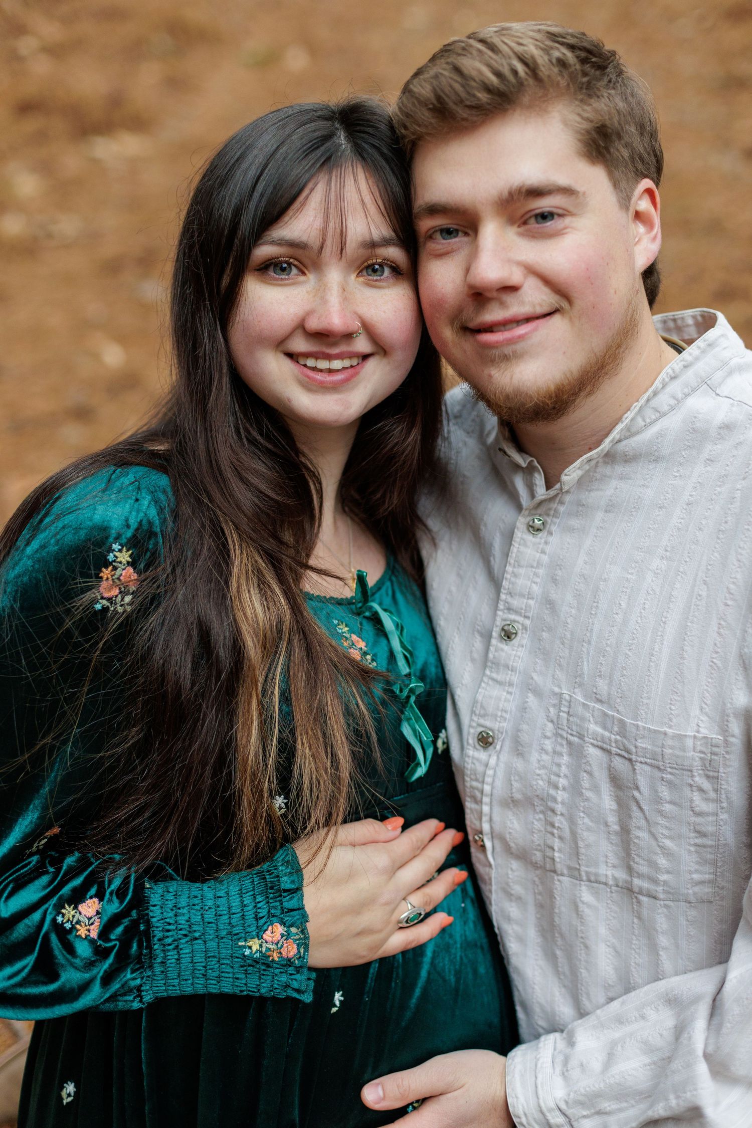 portrait of expectant mom with dad outside in Williamsport, Pennsylvania