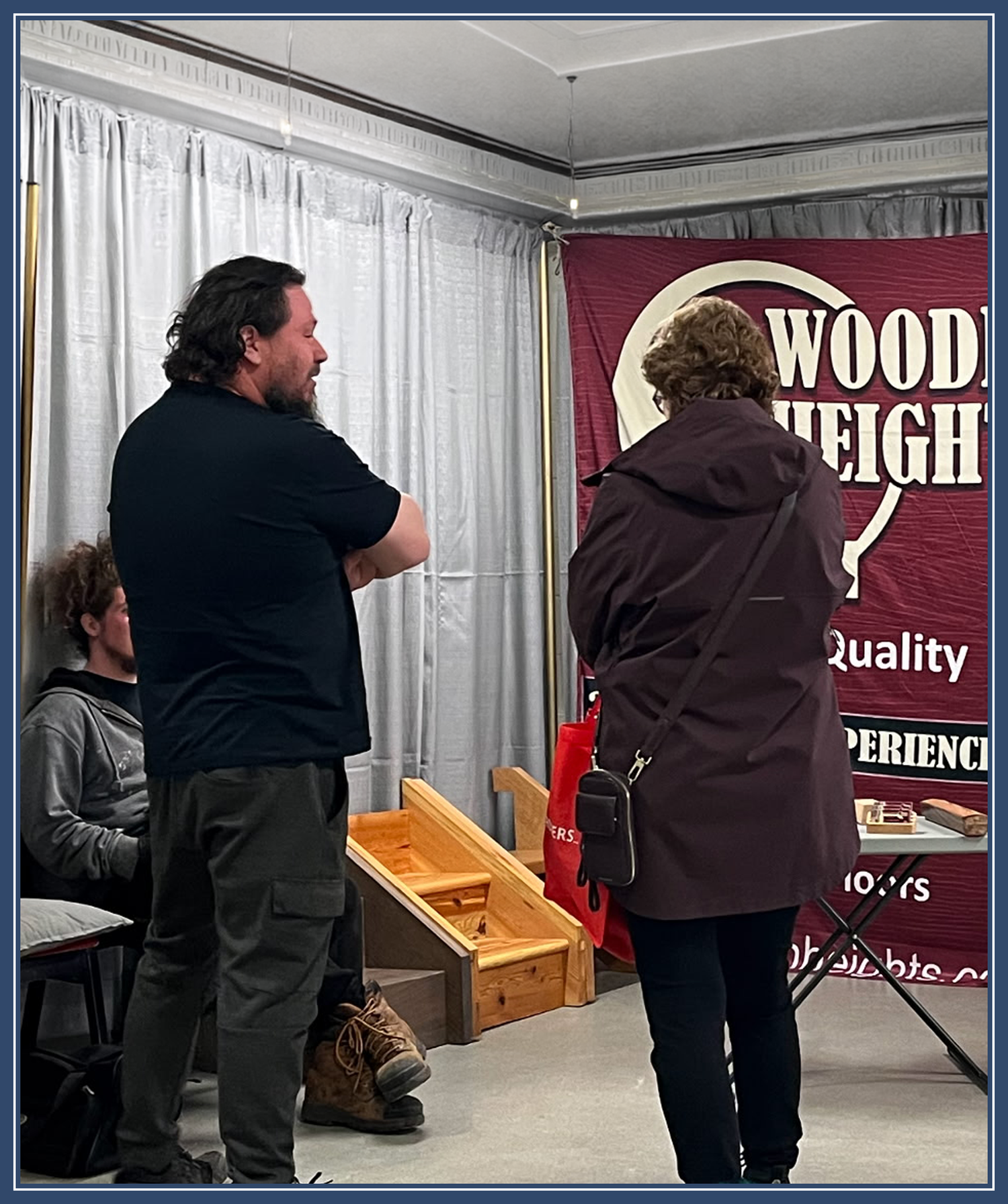 Steve  presenting wooden products at Wooden Heights trade show booth.