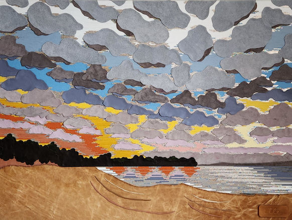 Colorful paper collage artwork depicting a dramatic sunset over a lake with layered clouds in gray, blue, and yellow tones.