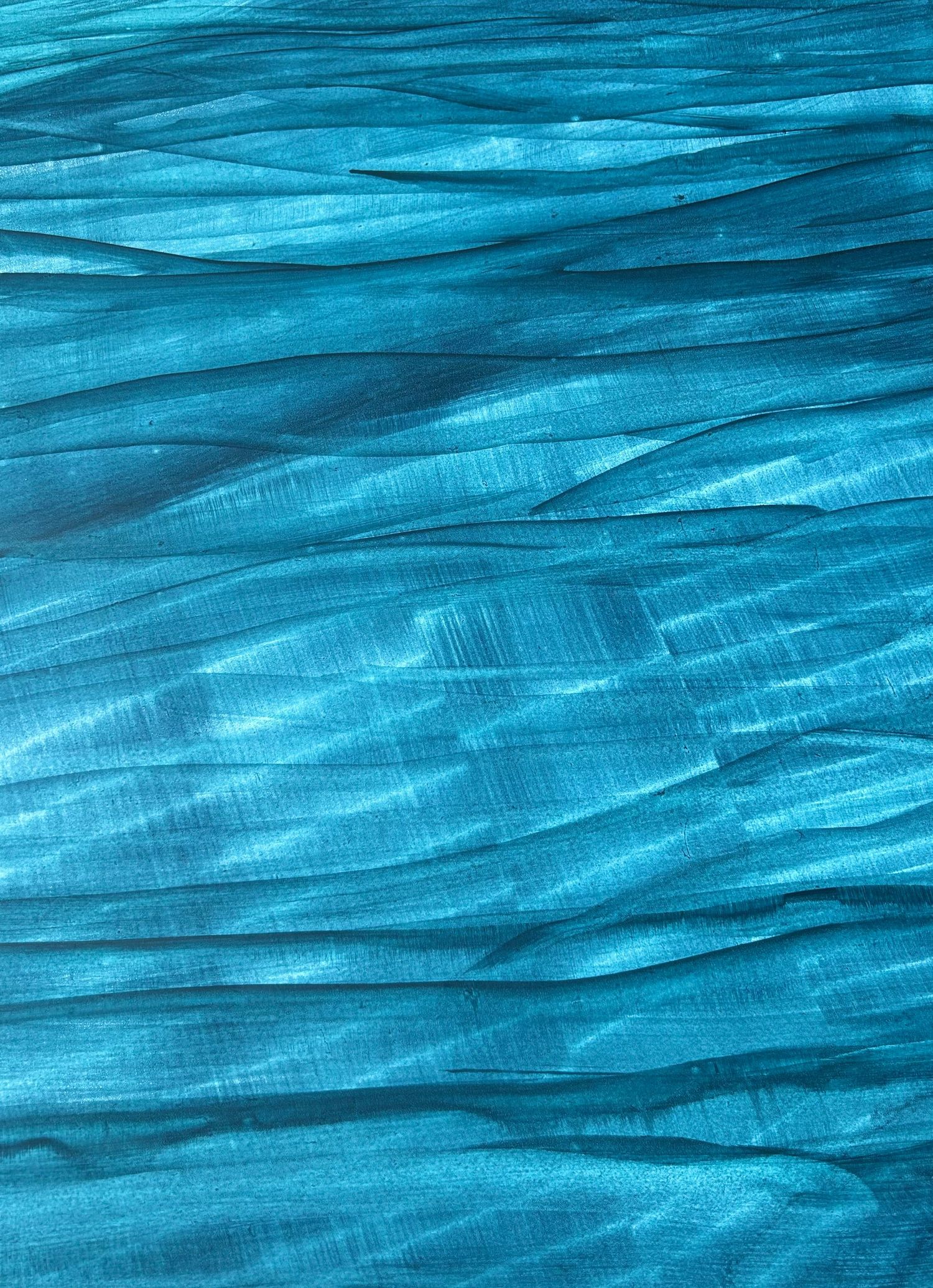Abstract teal blue brushstroke texture with layered wave patterns creating a vibrant aqua background.
