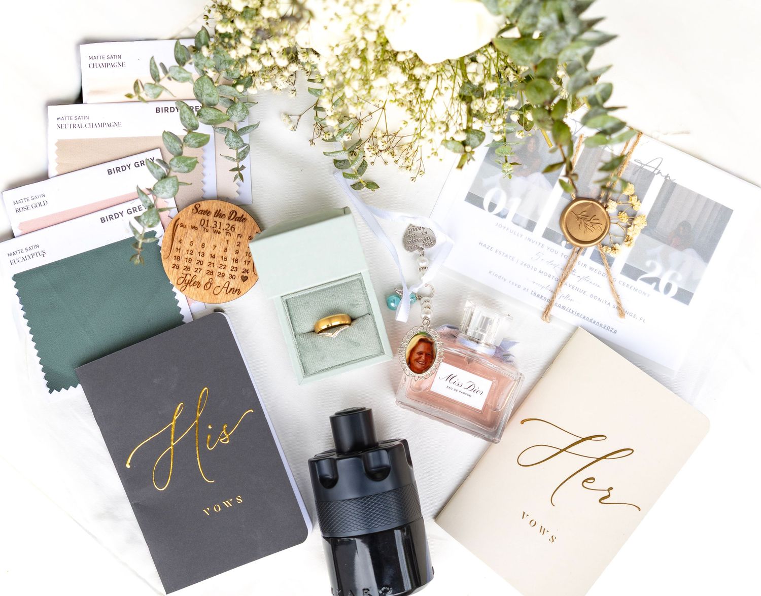 His and Hers wedding gift box set with perfume, ring, calendar, fabric swatches, and elegant gold foil stationery.