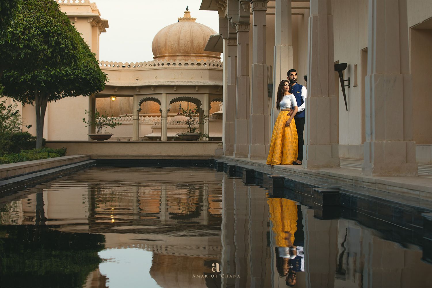 Prash and Amee pre-wedding portraits – Indian bride and groom at reflective pool of historic Rajasthani palace, cinematic destination Indian