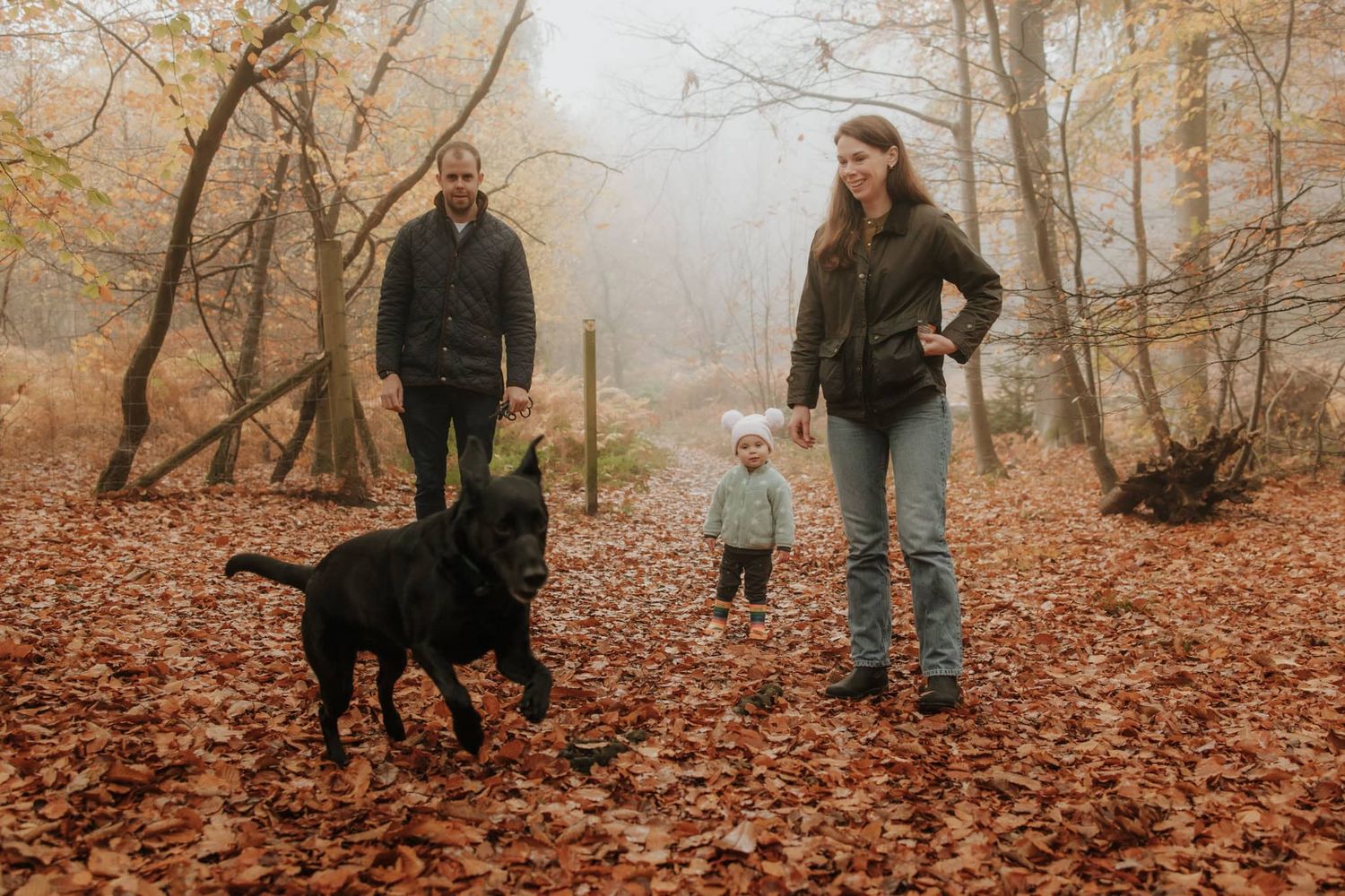A family- together with their dog- walk through Marlow Common on a relaxed family photo session.