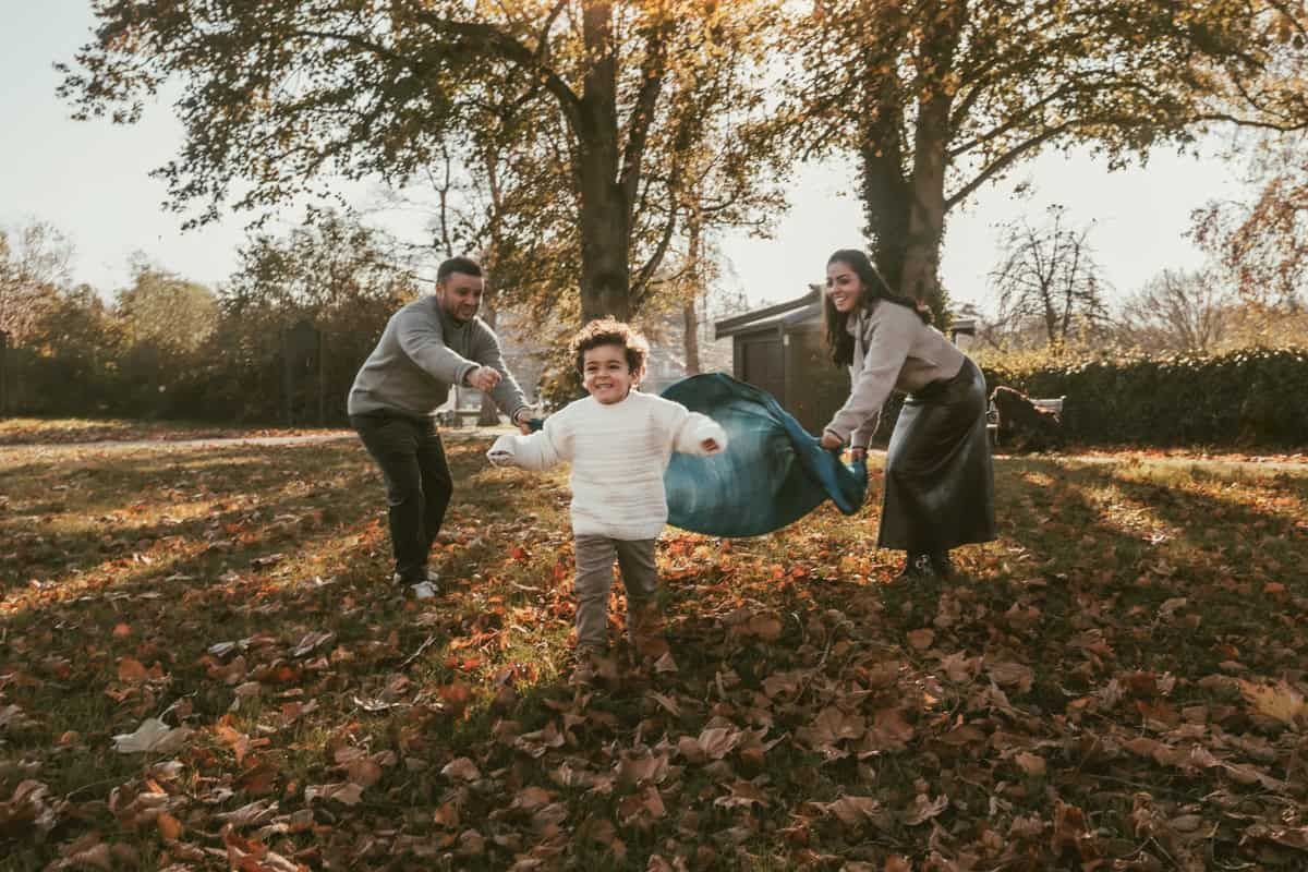 An example of a photo using games and prompts at a lifestyle photo session in Marlow, capturing natural connection and movement.