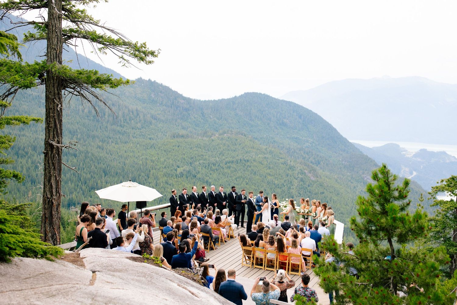 Outdoor mountain ceremony overlooking valley in Squamish.