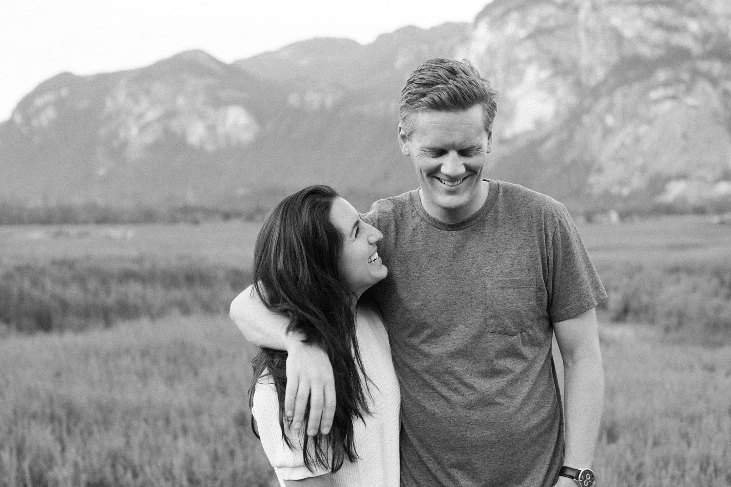 Couple laughing at Furry Creek Gold and Country Club wedding.