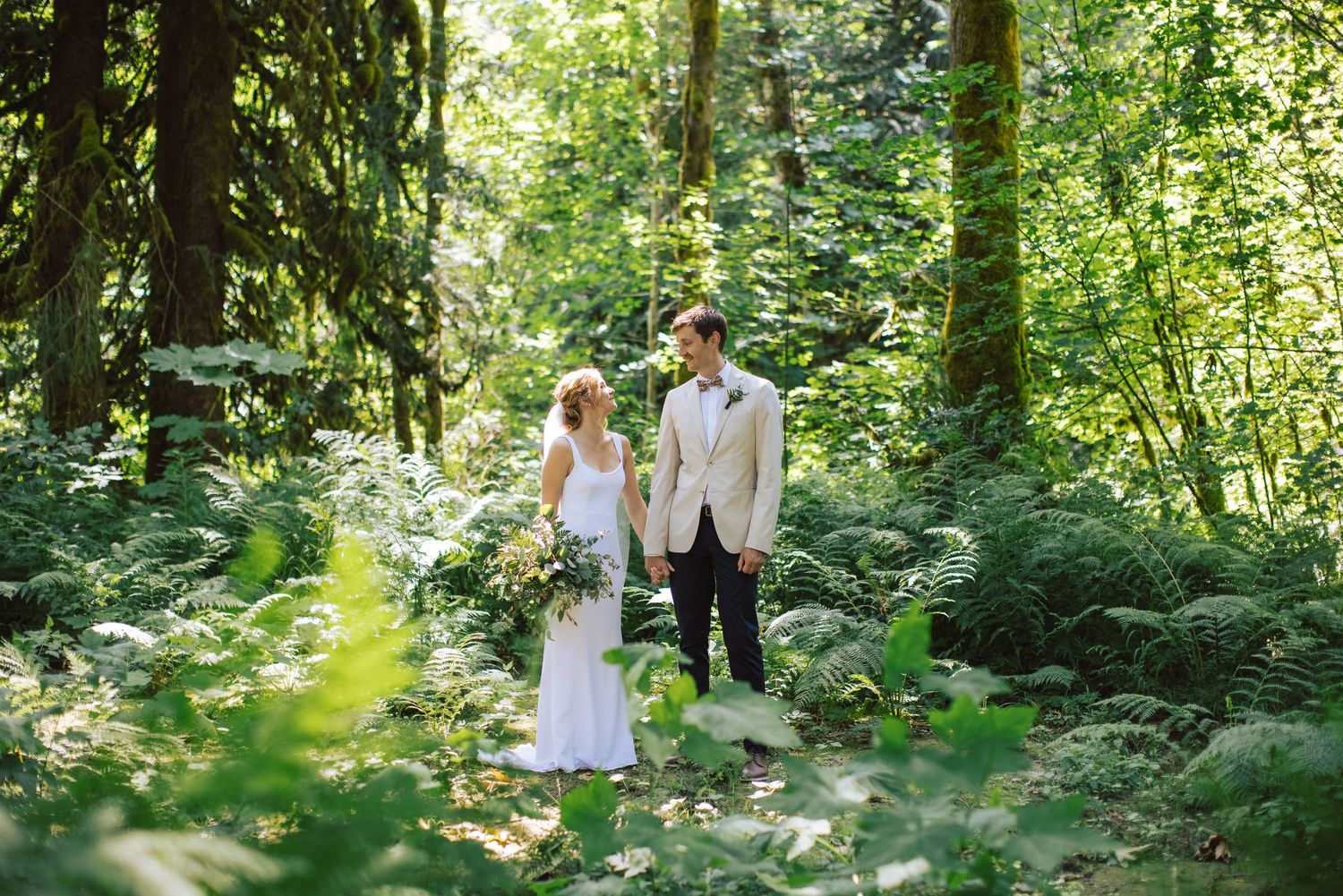 Wedding couple portrait in the forest.