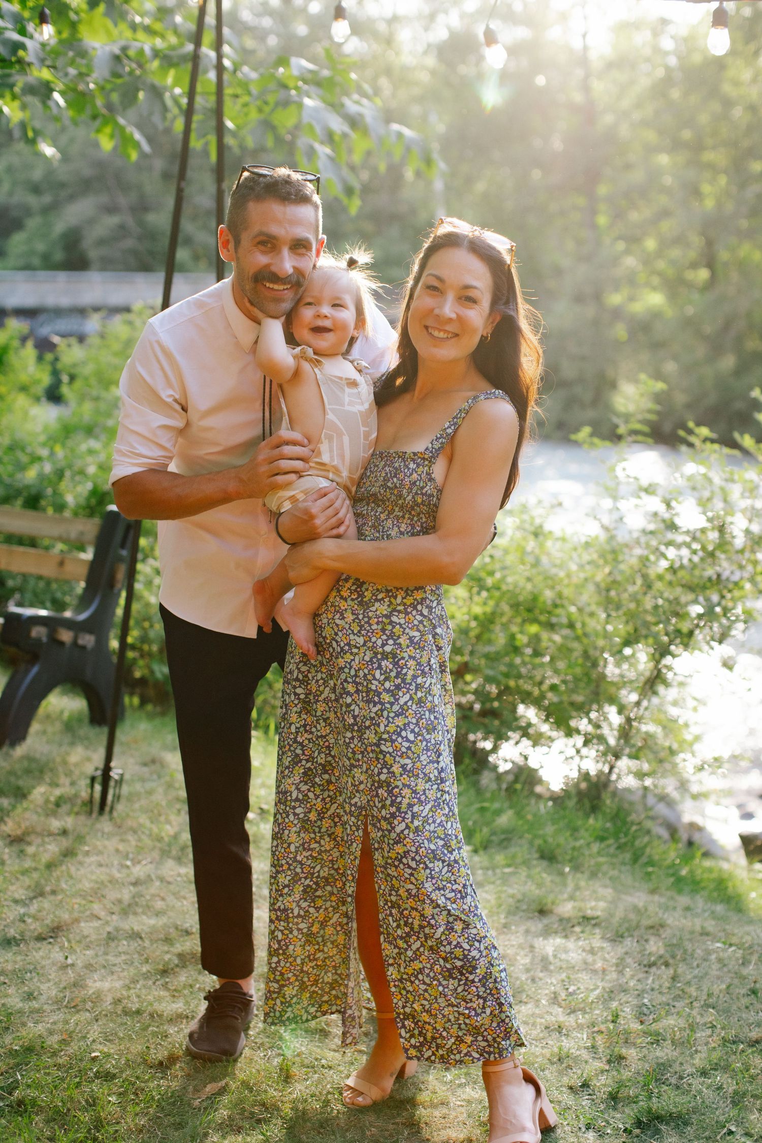 Family hugging at a wedding.