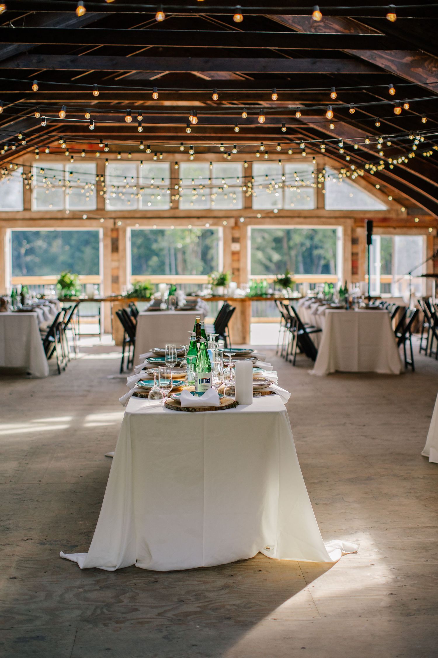 Table setting inside the barn at Glacier Valley Farm wedding in Squamish, BC.
