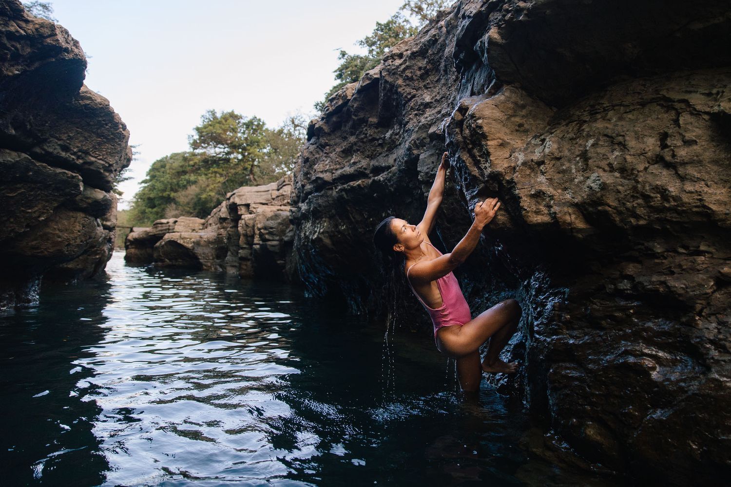 Woman deep water soloing.
