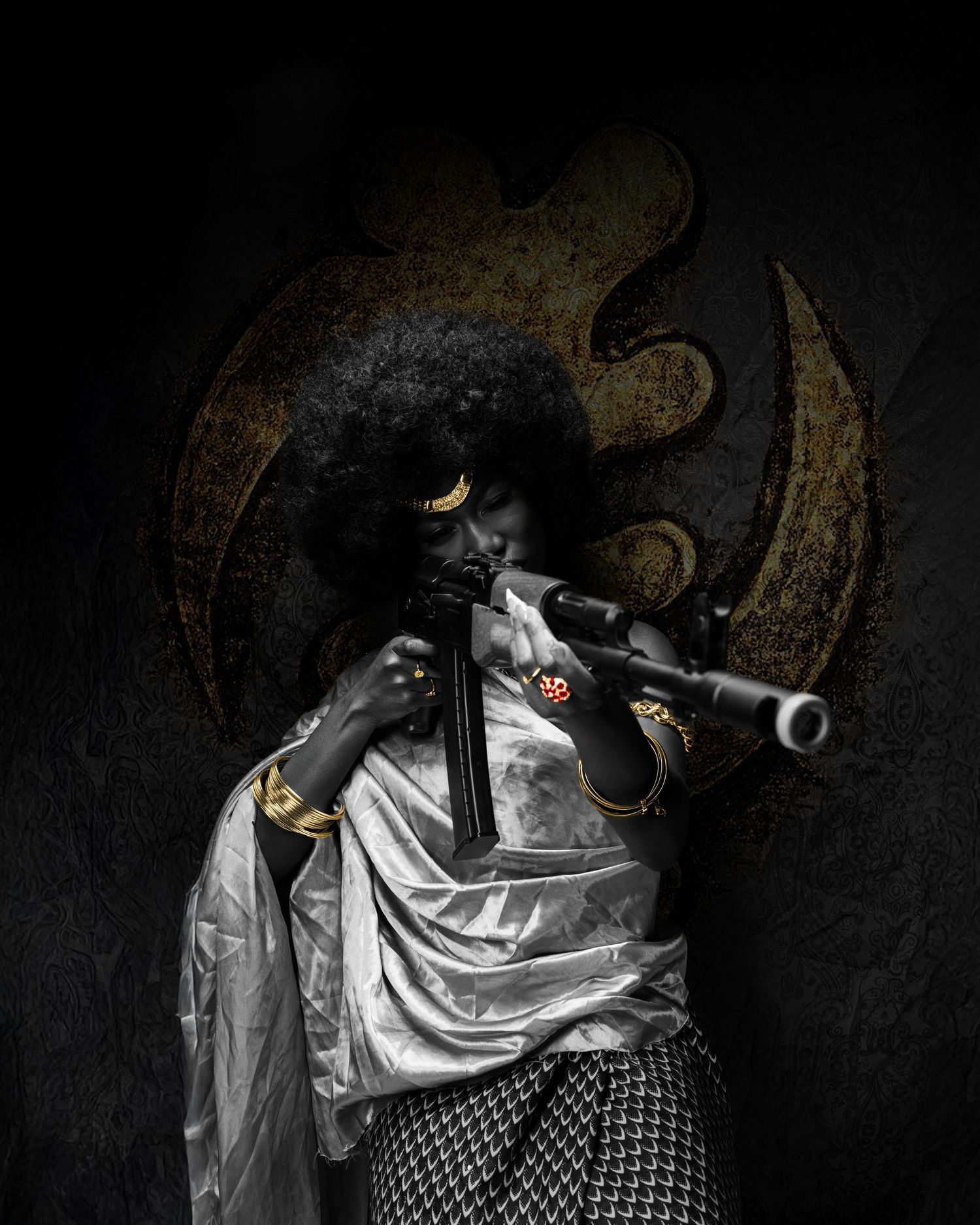A person with an afro plays a flute, wearing gold jewelry and a white shawl against a dark background.
