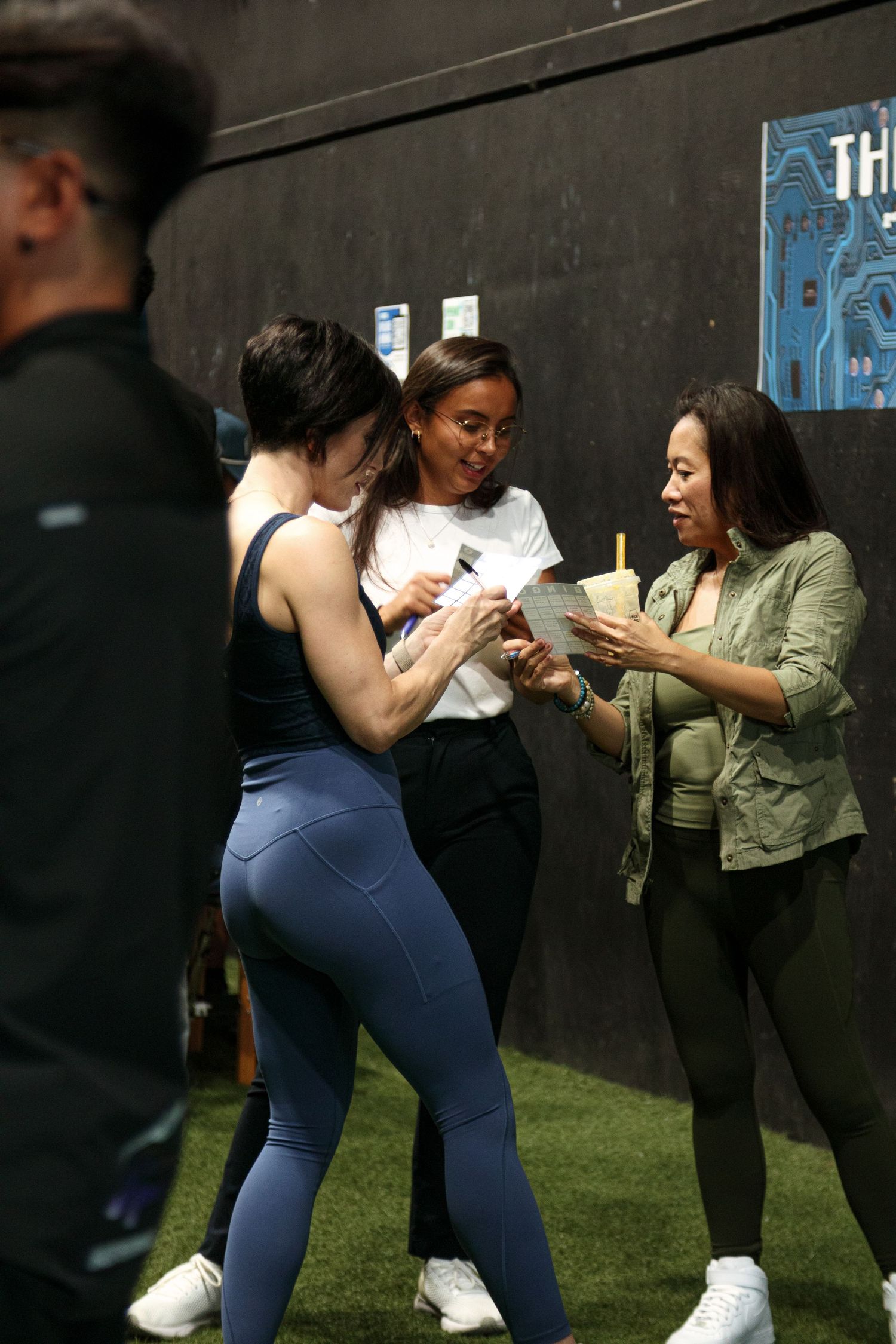 People dancing and socializing at an outdoor event.
