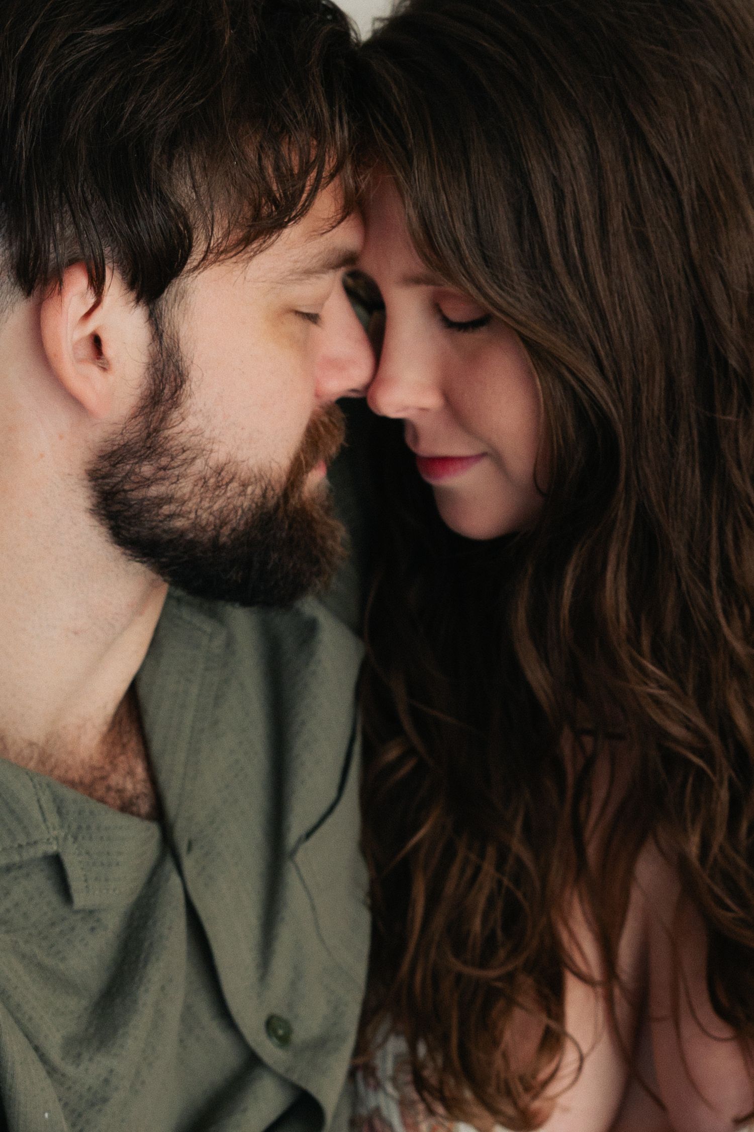 Tender moment. between couple before they welcome their baby. Moment captured during maternity photography session in Fort Worth
