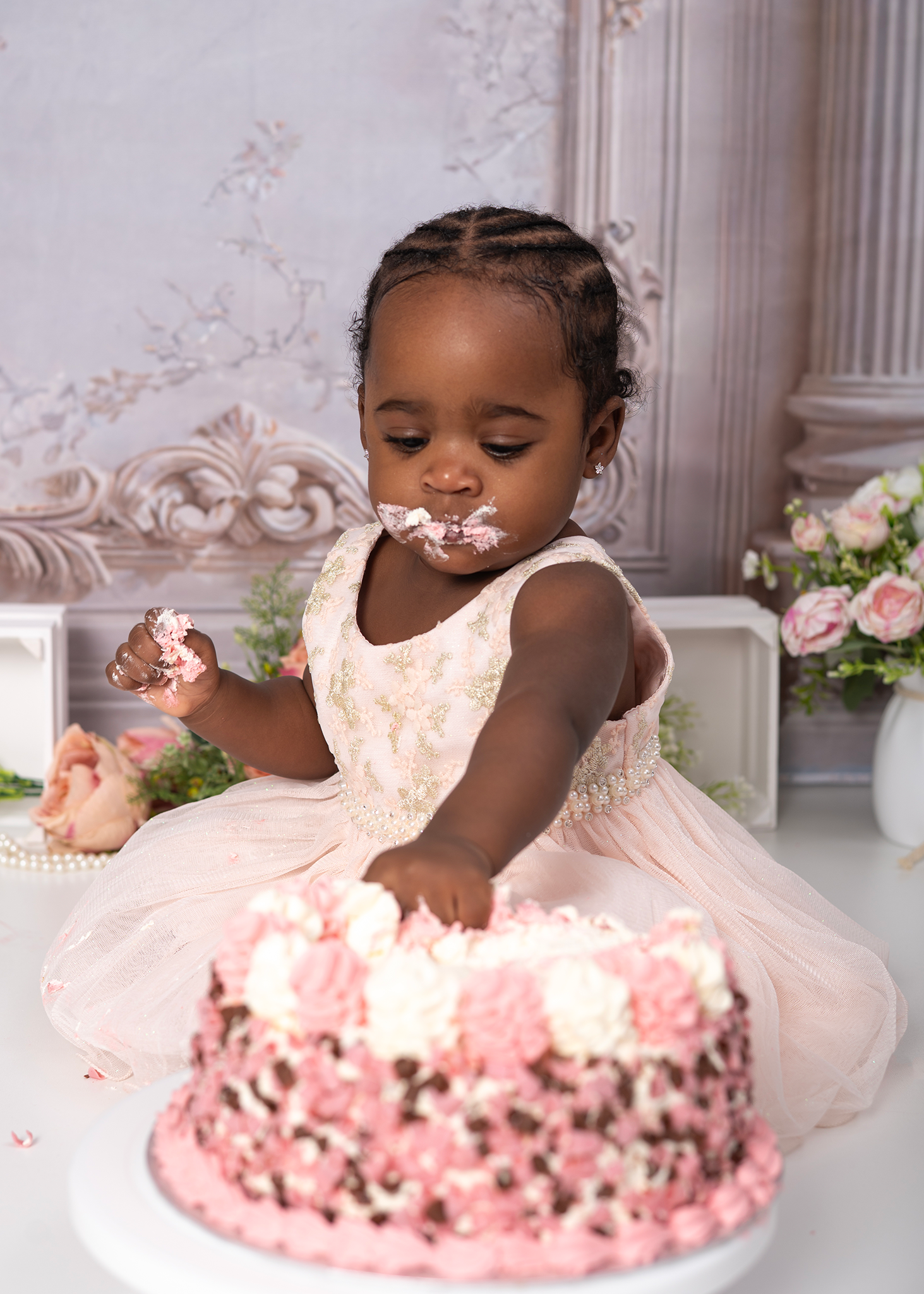 Creative first birthday cake smash photoshoot in Spalding, professional baby photography studio near Peterborough and Wisbeach