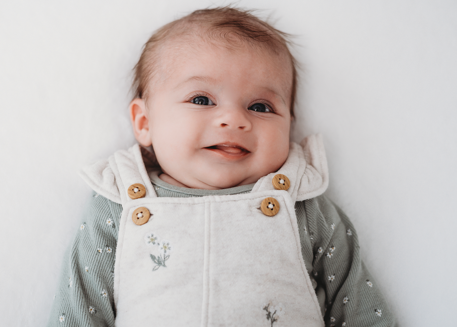 Baby girl newborn portrait in soft neutral tones in Lincolnshire studio
