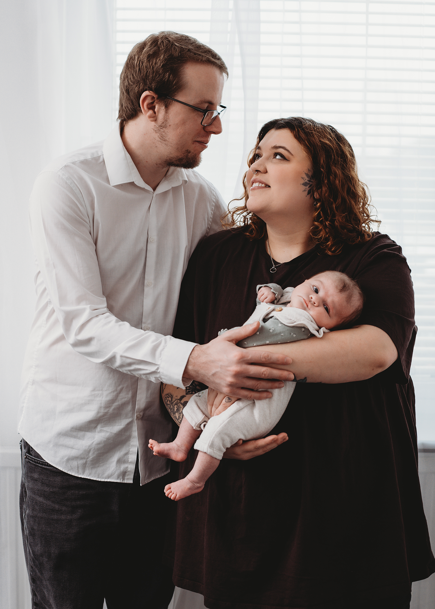 Timeless newborn portrait with parents in Spalding Lincolnshire photography studio