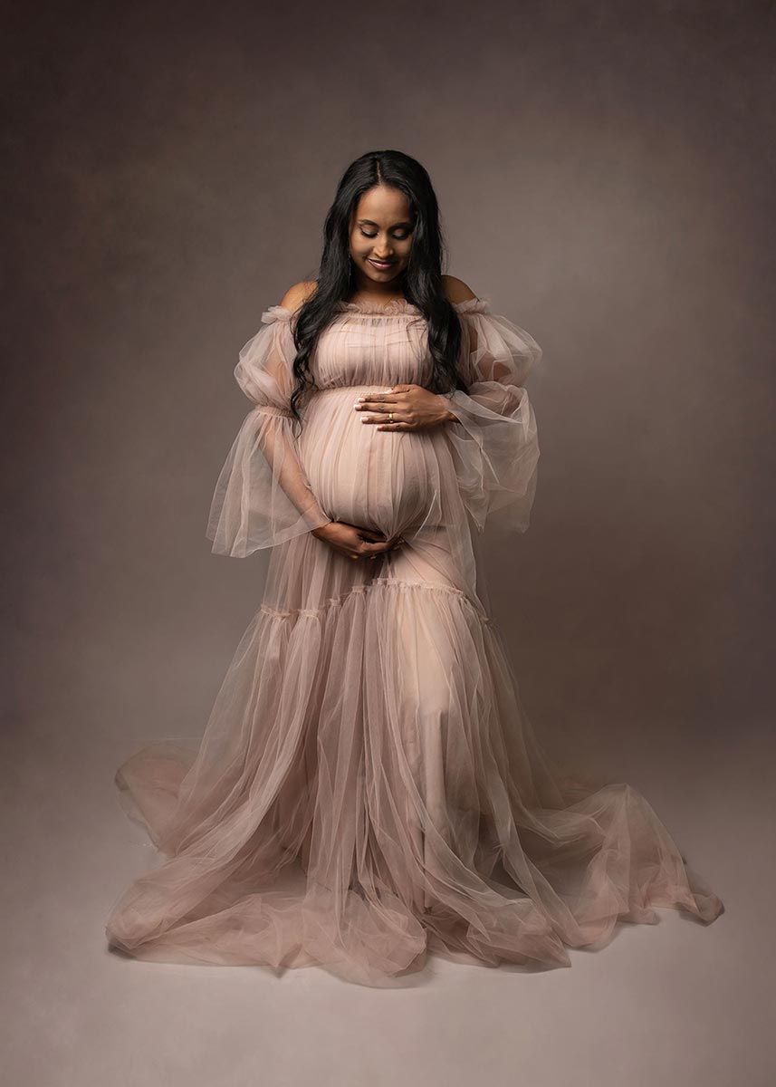 pregnancy photoshoot Boston soft maternity portrait studio setting