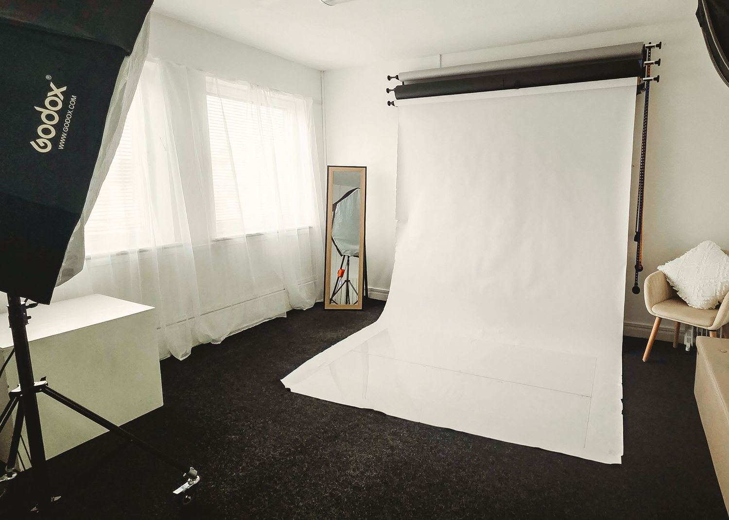 Main shooting area inside A&B Art Studio Photography studio in Spalding with white backdrop and professional lighting equipment