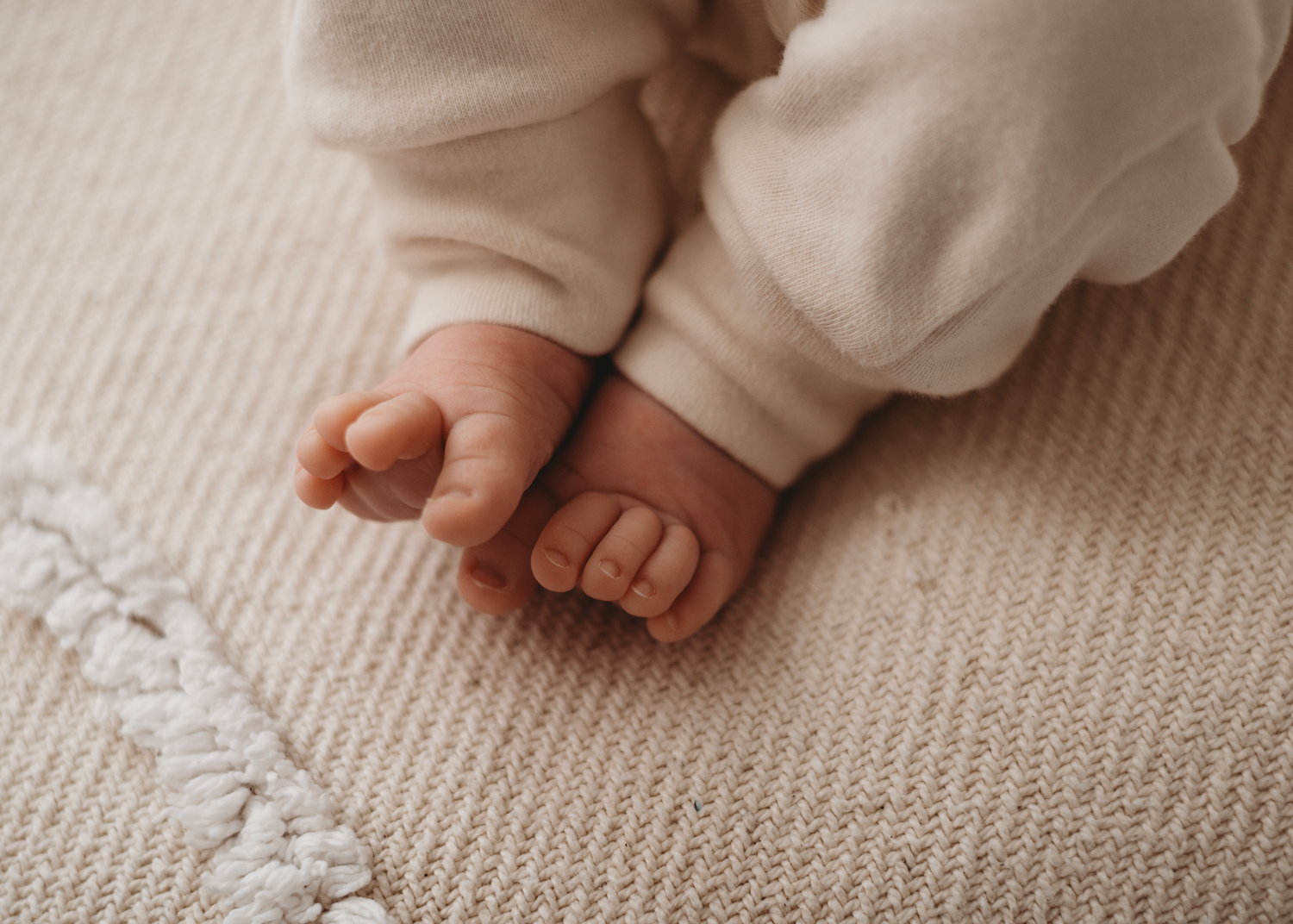 Newborn lifestyle session near Peterborough with gentle studio lighting
