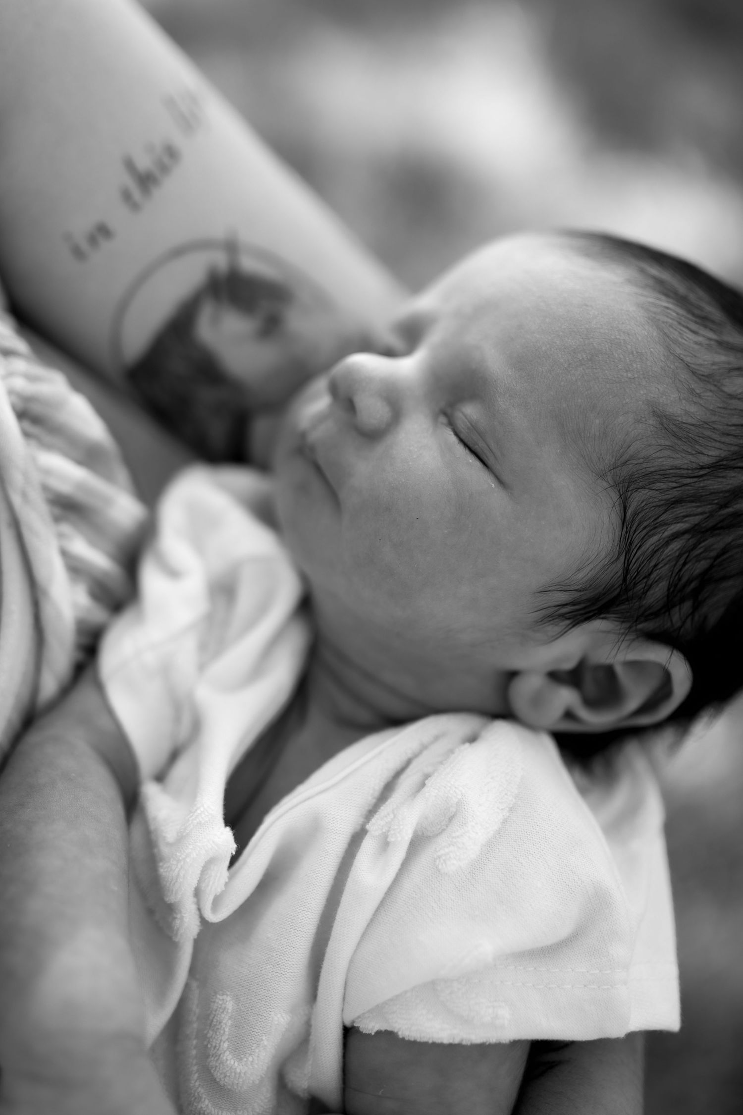 Intimate black and white close-up portraits showing gentle expressions.