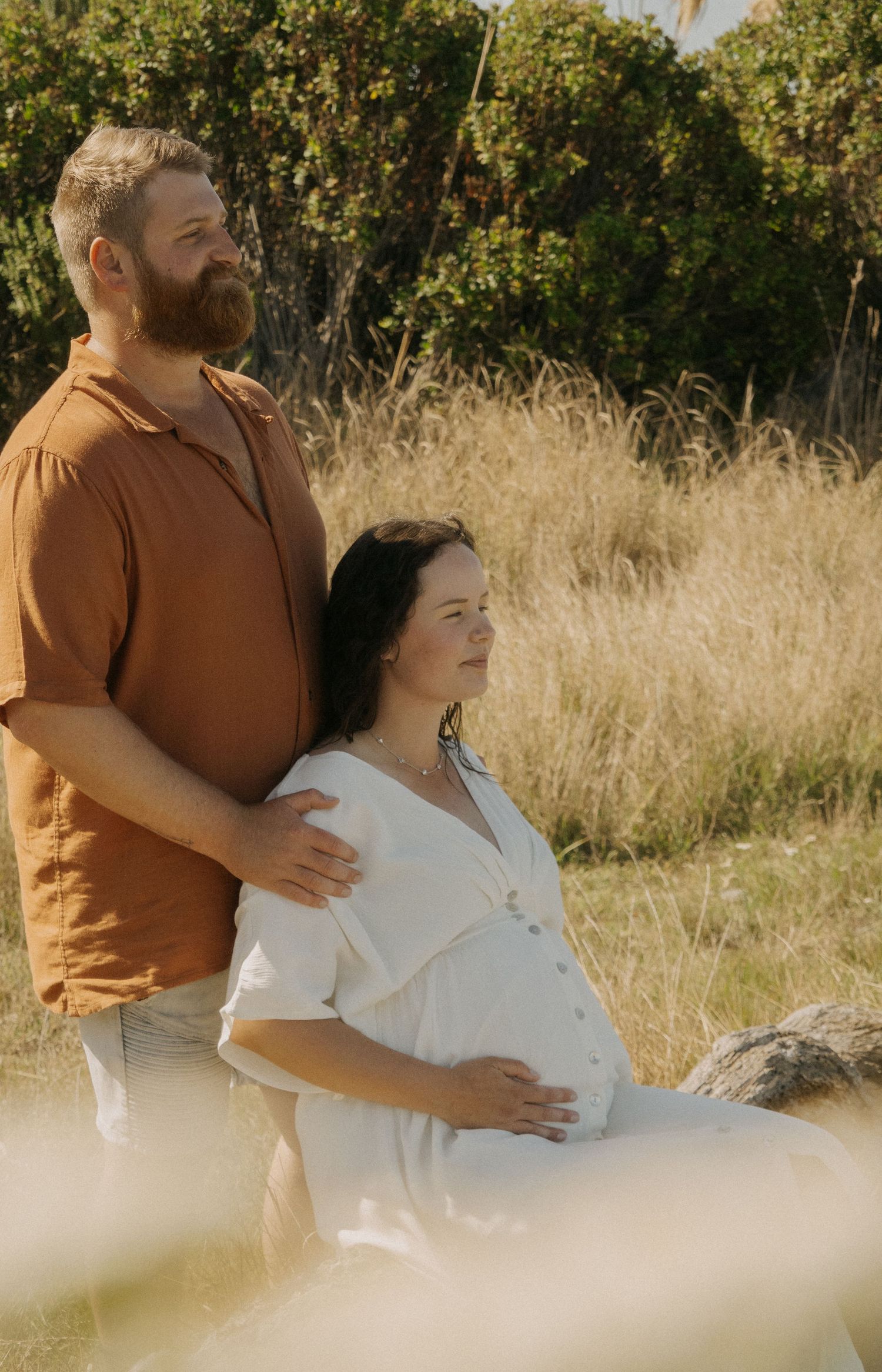 maternity session in the grass