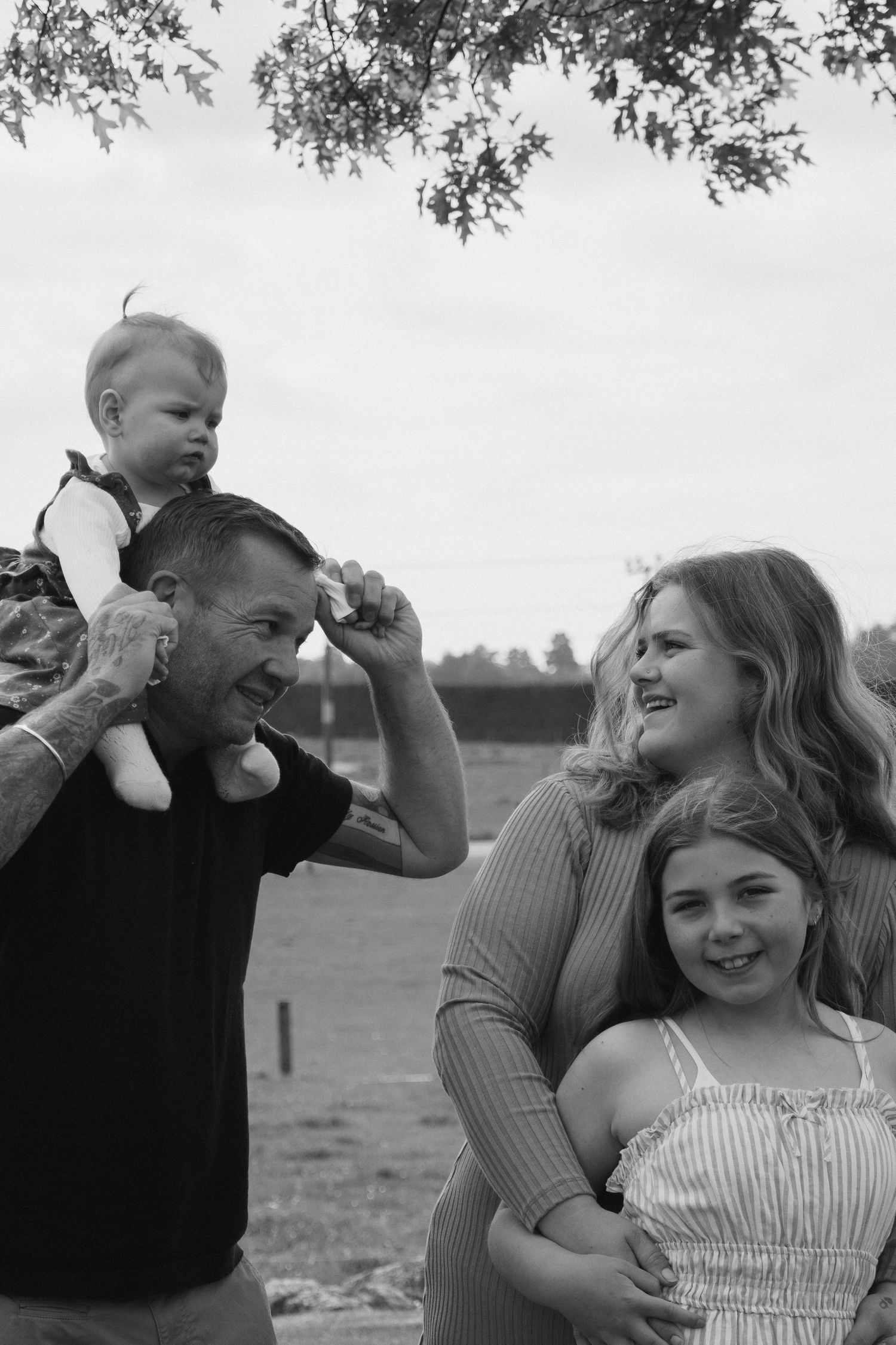 family photo, parent and kids cuddling