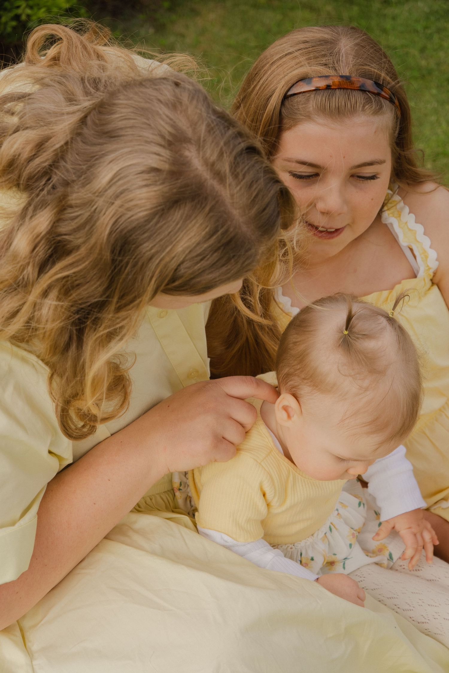 detail shot of mother and daughters
