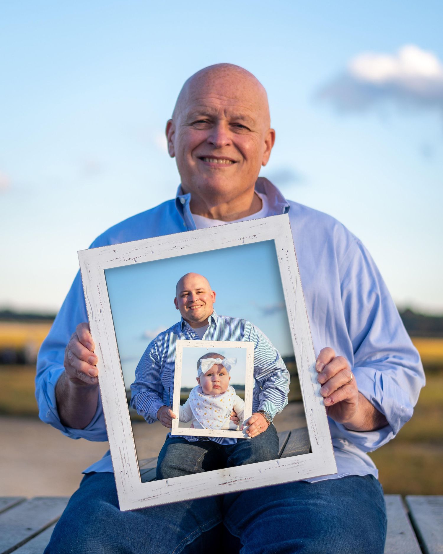 A recursive photo series shows a person holding progressively smaller framed versions of themselves outdoors.