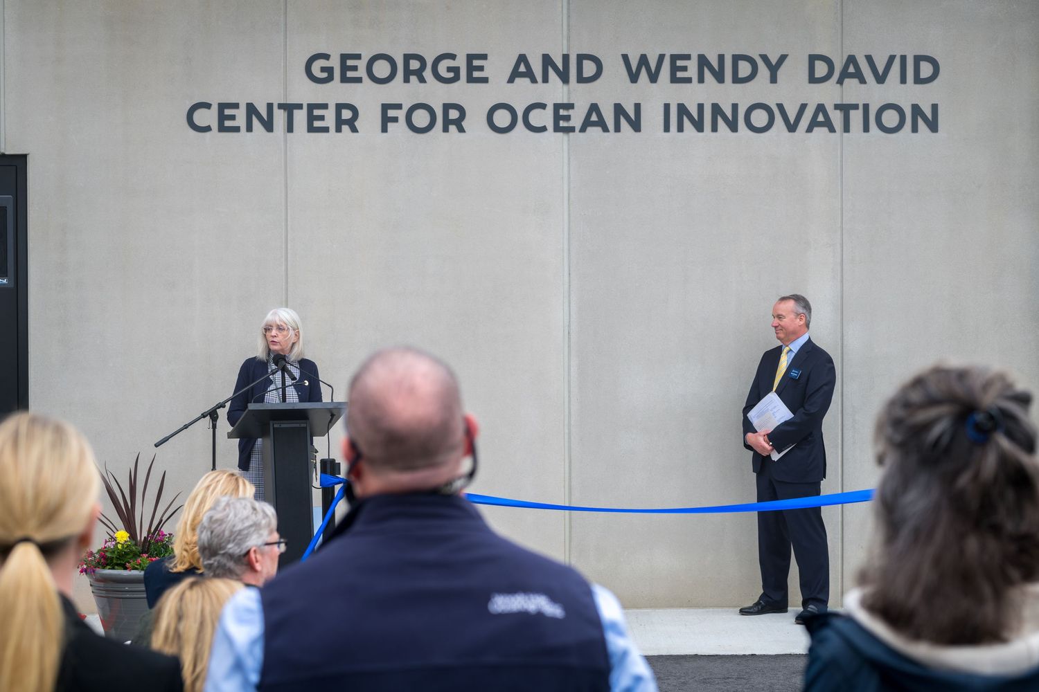Wide shot of audience seated at George and Wendy David Center for Ocean Innovation event.
