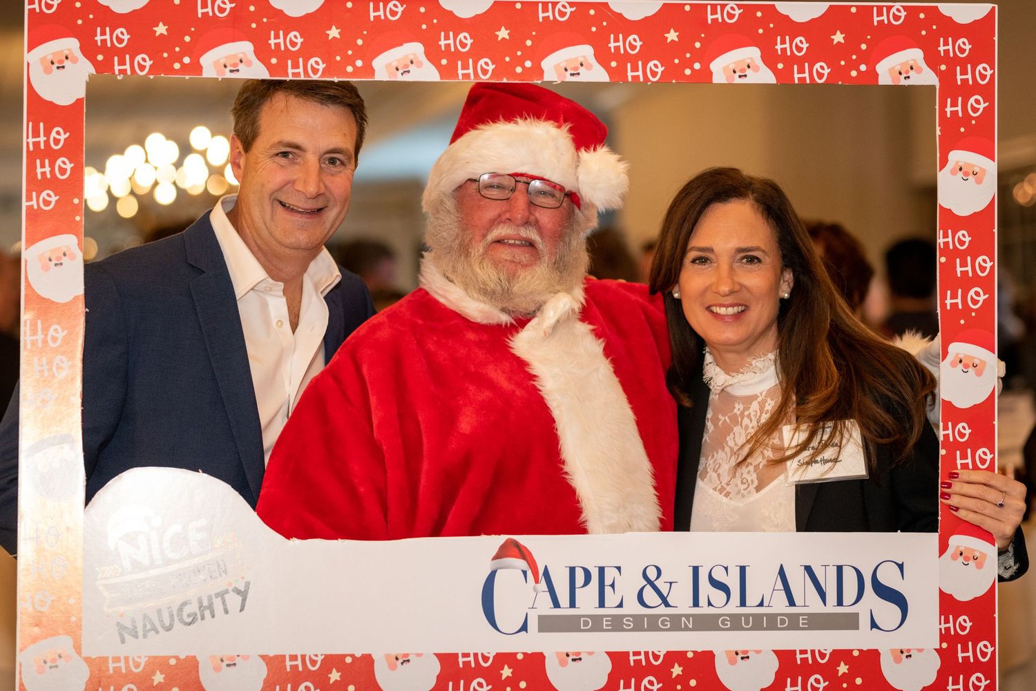 Holiday photo with Santa Claus at Cape & Islands magazine event.