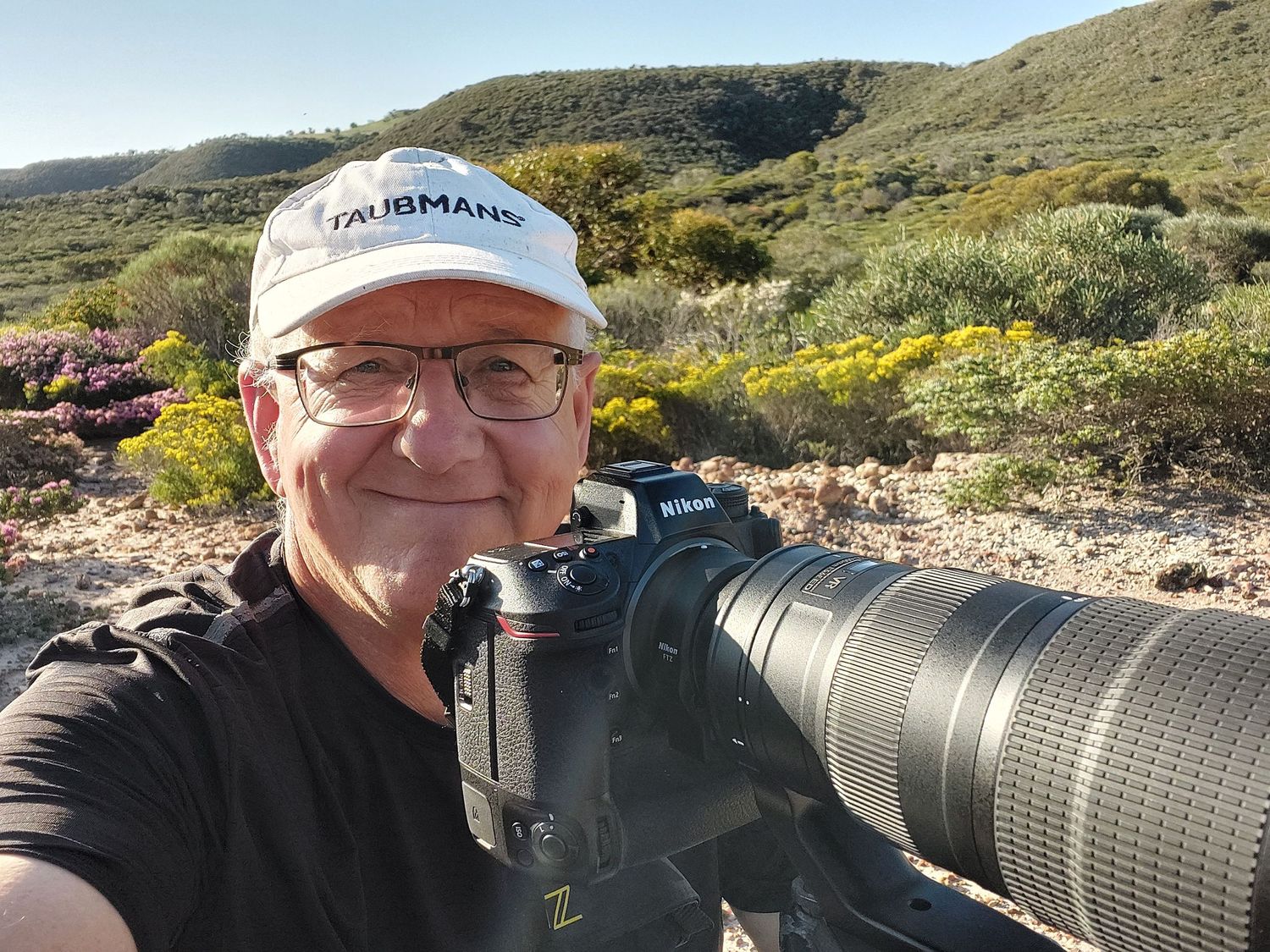 Bill Belson with camera set up in Howatharra NR