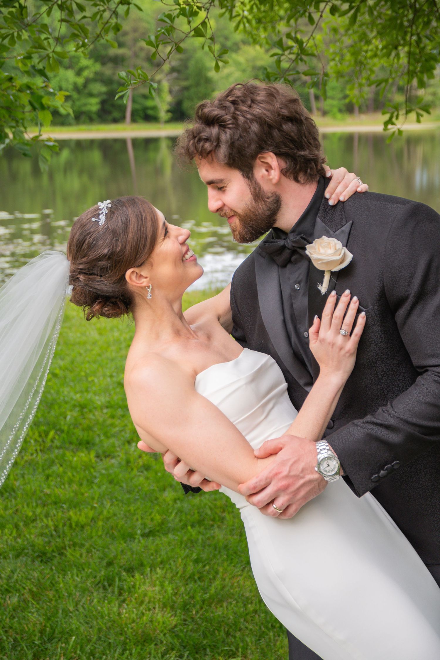 Candid wedding moment of Kathleen and Max, highlighting authentic emotion and professional bridal beauty artistry.