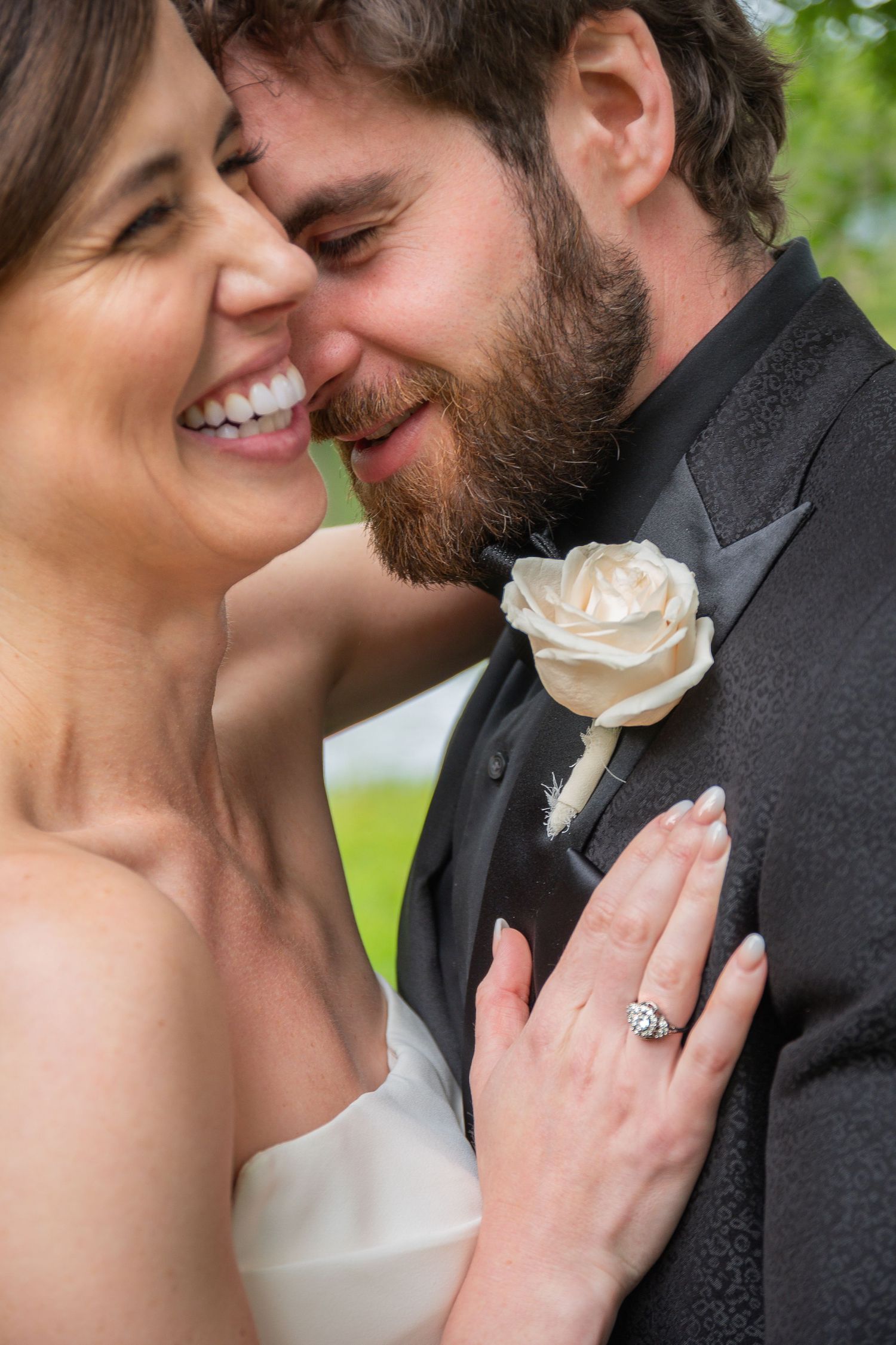 Candid wedding moment of Kathleen and Max, highlighting authentic emotion and professional bridal beauty artistry.