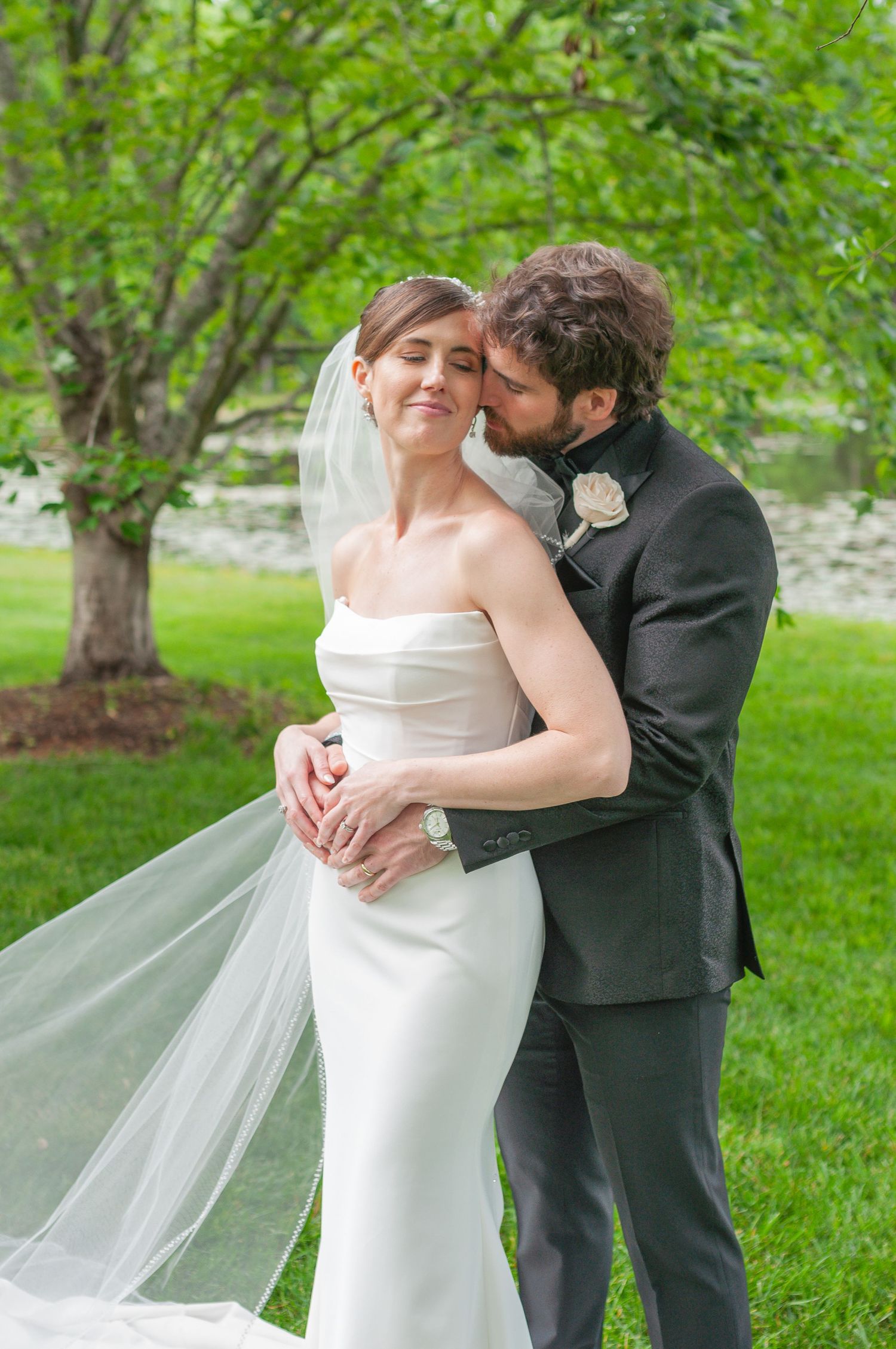 Candid wedding moment of Kathleen and Max, highlighting authentic emotion and professional bridal beauty artistry.