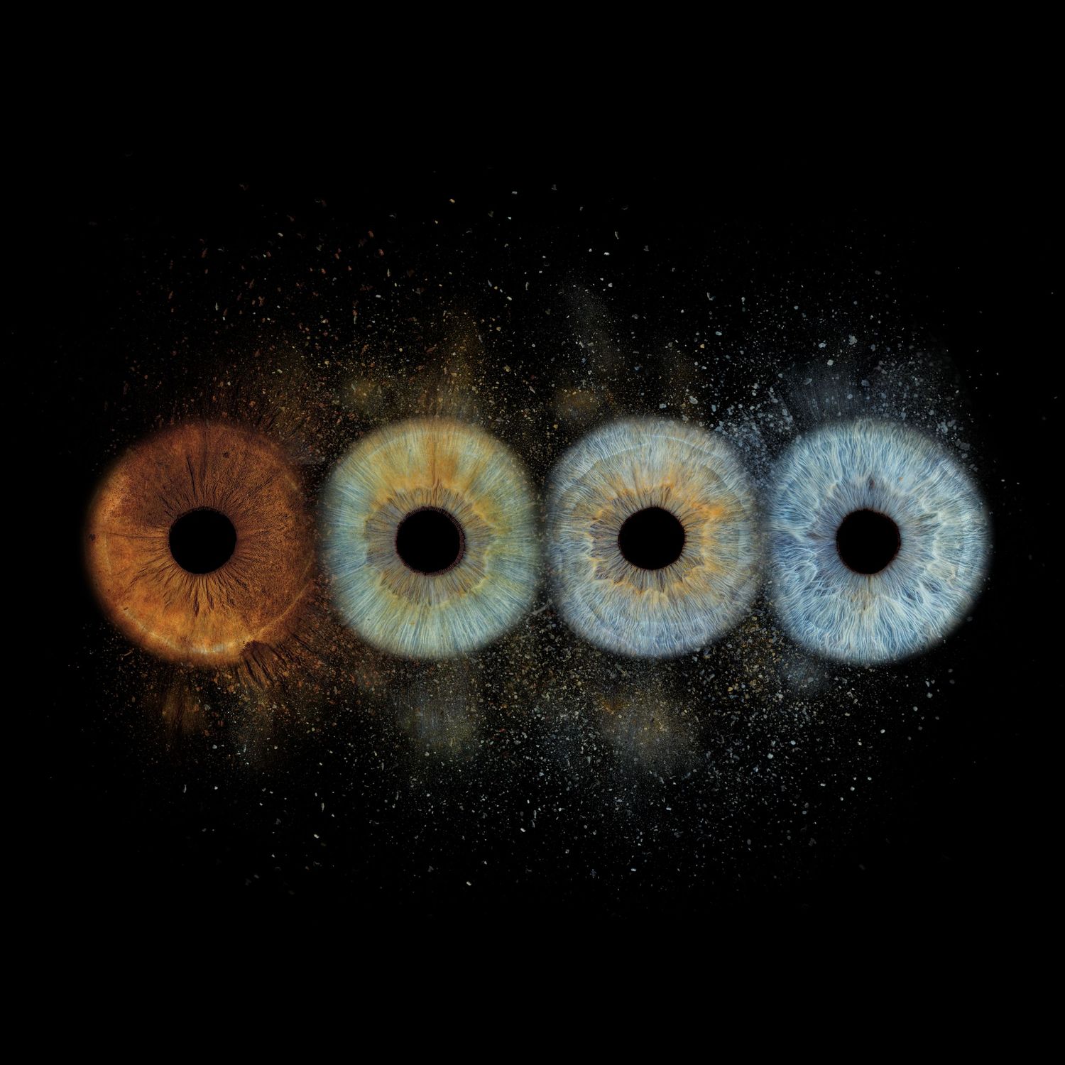 Four human irises in a row transitioning from warm amber to cool blue tones on a black background with golden particles.