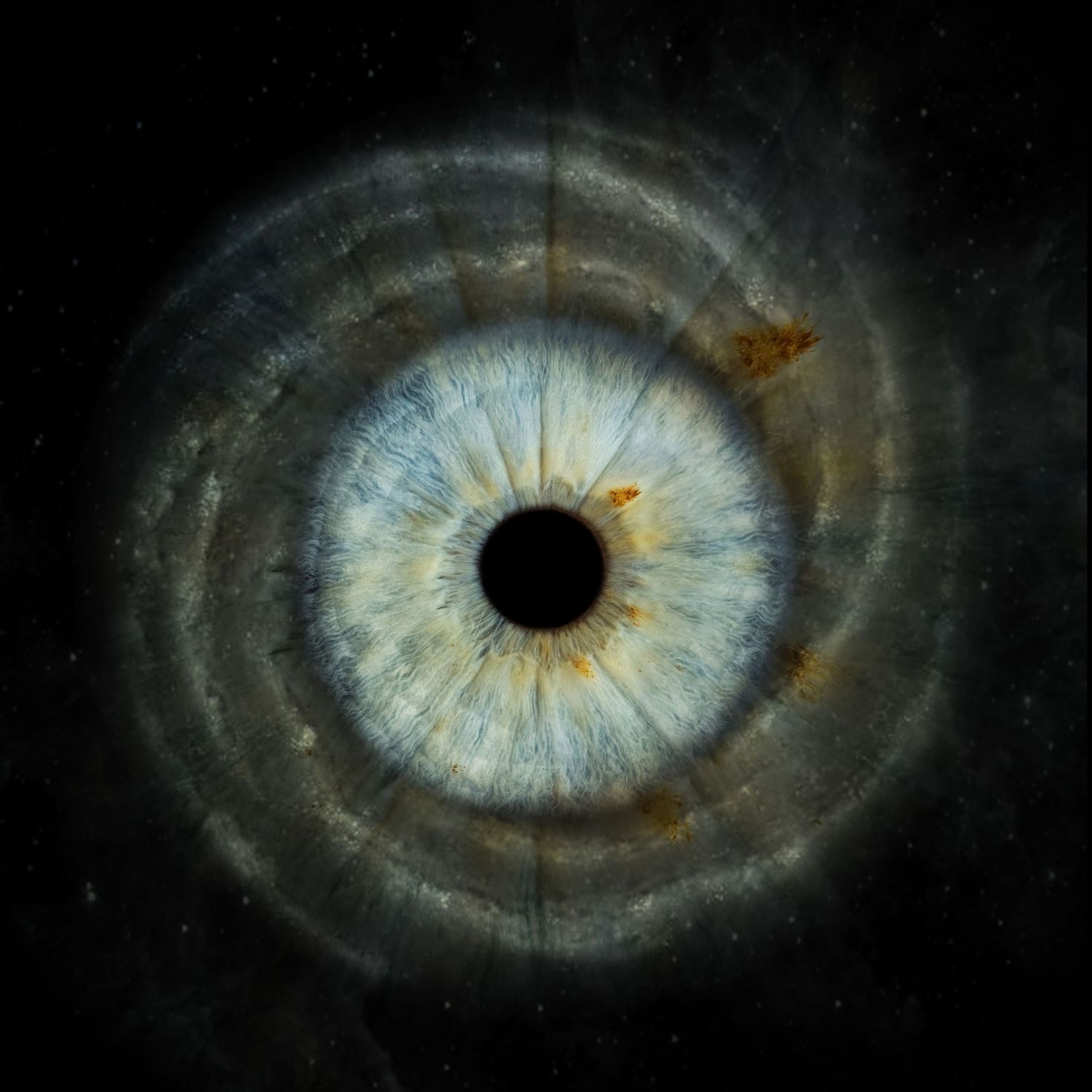 A macro close-up of a blue human iris with galaxy-like ripple rings expanding outward on a dark cosmic background.
