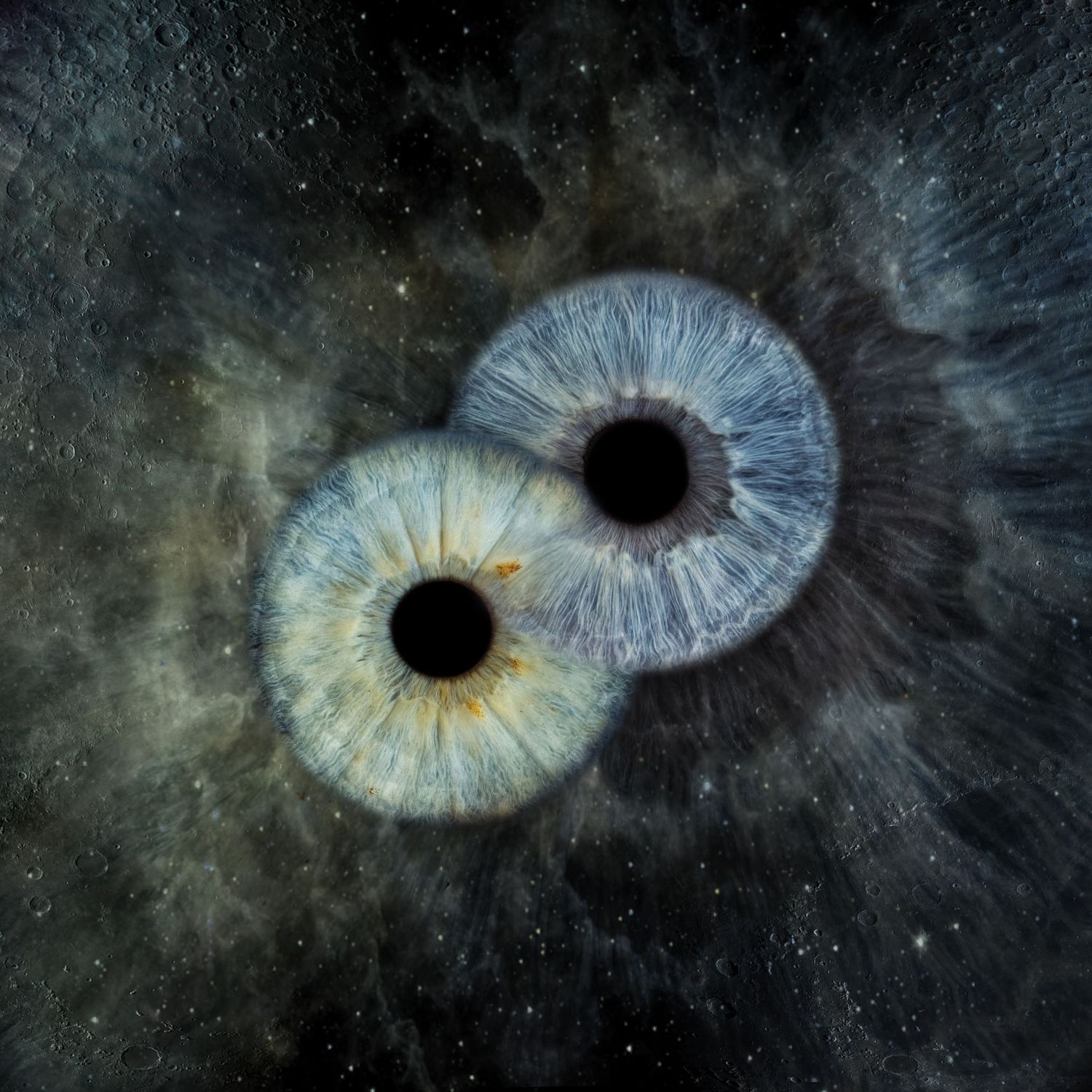 Two overlapping blue human irises merging together against a dark cosmic nebula space background.