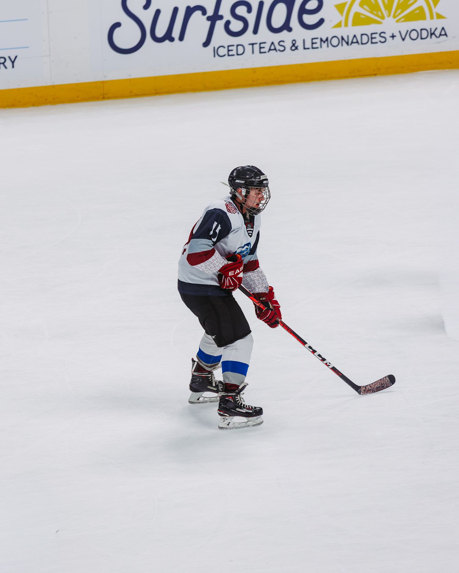 Player on the ice during the Pucks for Autism game at Ball arena